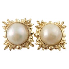 Pendientes con clip de perla Mabe de oro amarillo de 14 quilates #16443