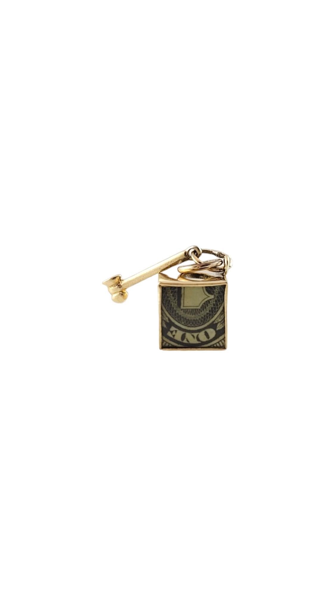 Vintage 14 Karat Yellow Gold Mad Money Box Charm -

This unique charm is crafted in 14K yellow gold and even contains a folded $1 bill! 

Size: 15.5 mm x 10.1 mm x 9.6 mm

Stamped: E14K

Weight: 2.4 dwt./ 3.8 gr.

*Chain not included.

Very good