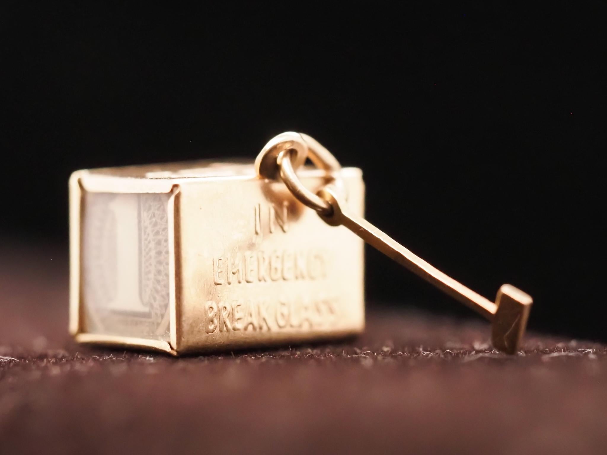 14K Yellow Gold Mad Money Dollar Bill Box Charm Pendant

Year: 1980s
Item Details:
Metal Type: 14K Yellow Gold [Hallmarked, and Tested]
Weight: 3.3 grams
Dimensions: 9/16 x 3/8x 3/8 inches
Condition: Excellent
vintage