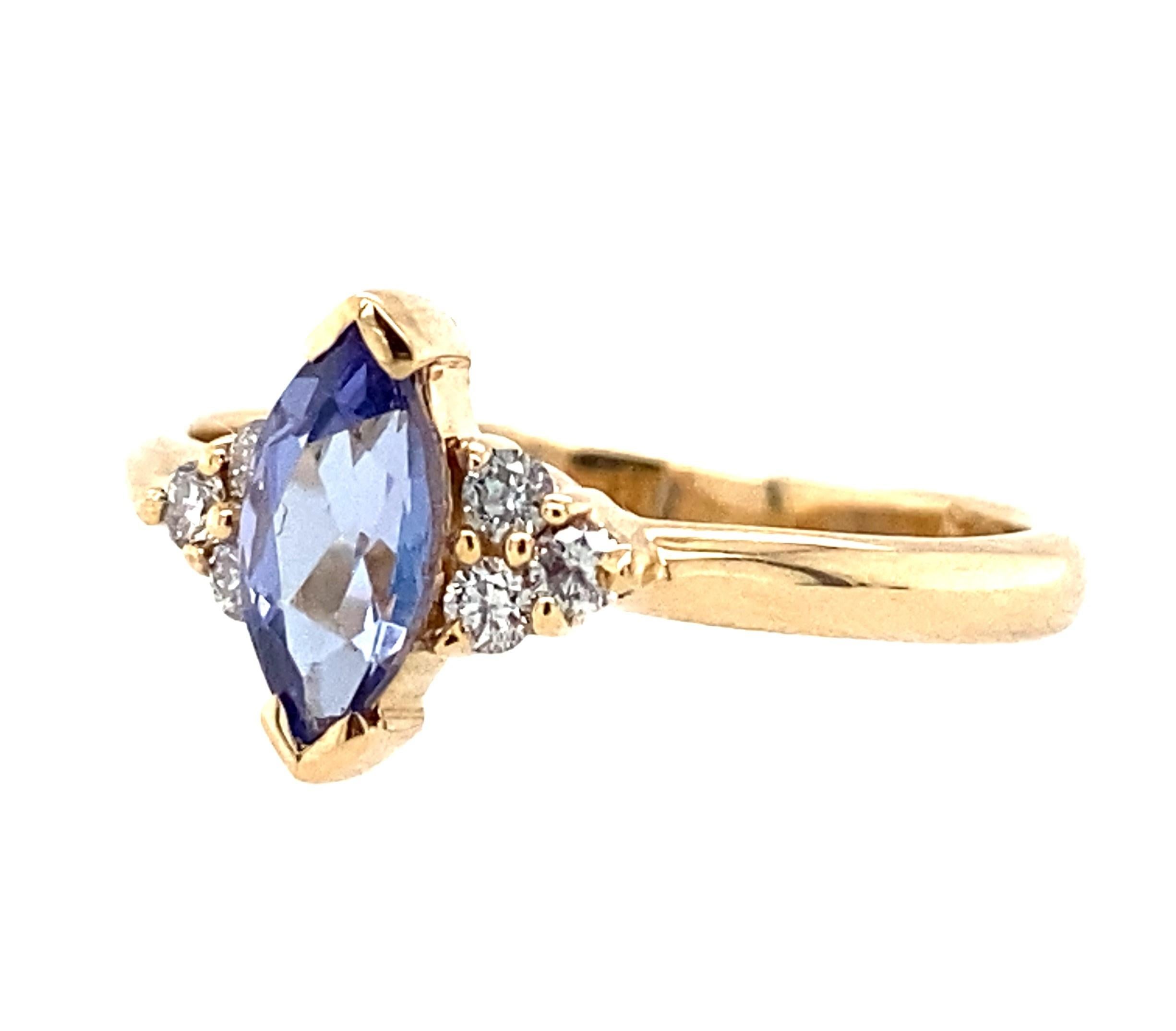 Women's or Men's 14K Yellow Gold Marquise Cut Tanzanite and Diamond Ring For Sale