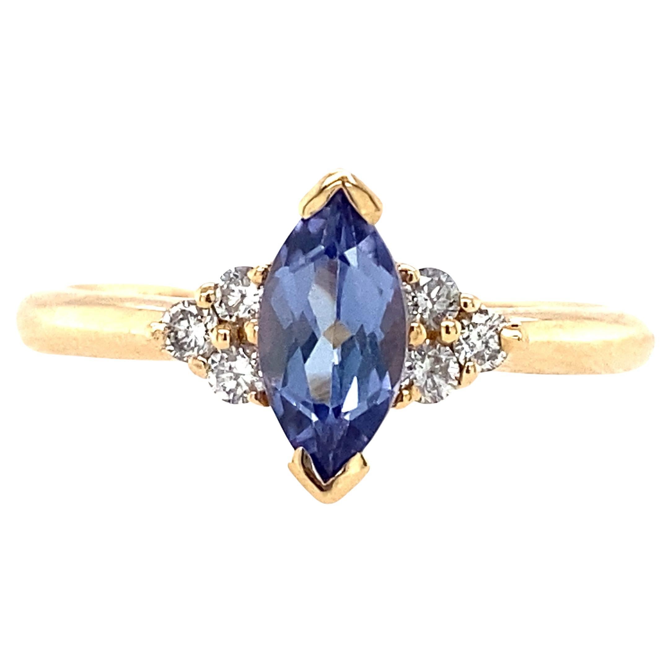 14K Yellow Gold Marquise Cut Tanzanite and Diamond Ring For Sale