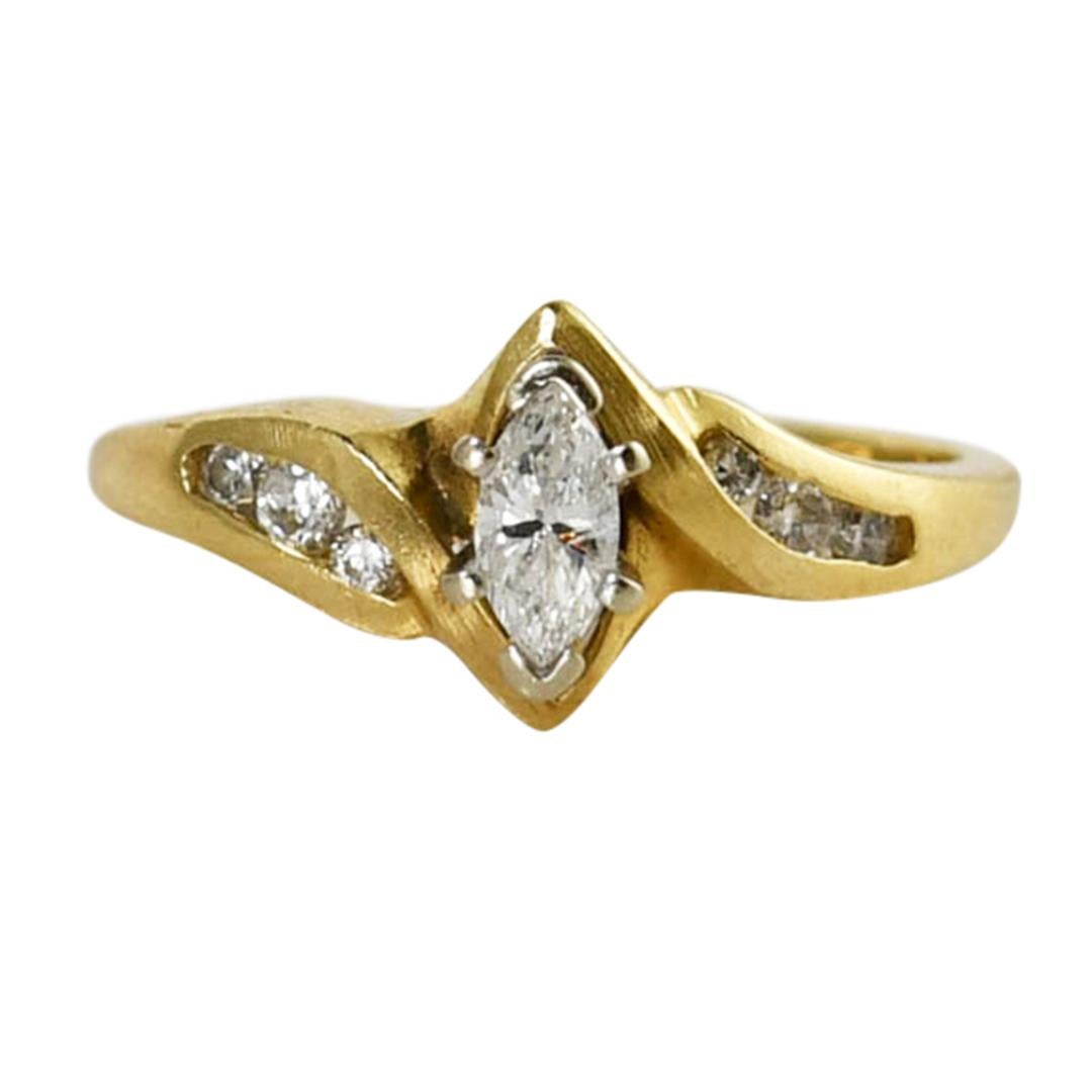 Bague de fiançailles en or jaune 14K avec diamant marquise 0.25ct