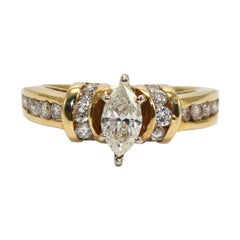 Anello di fidanzamento con diamante marquise in oro giallo 14K