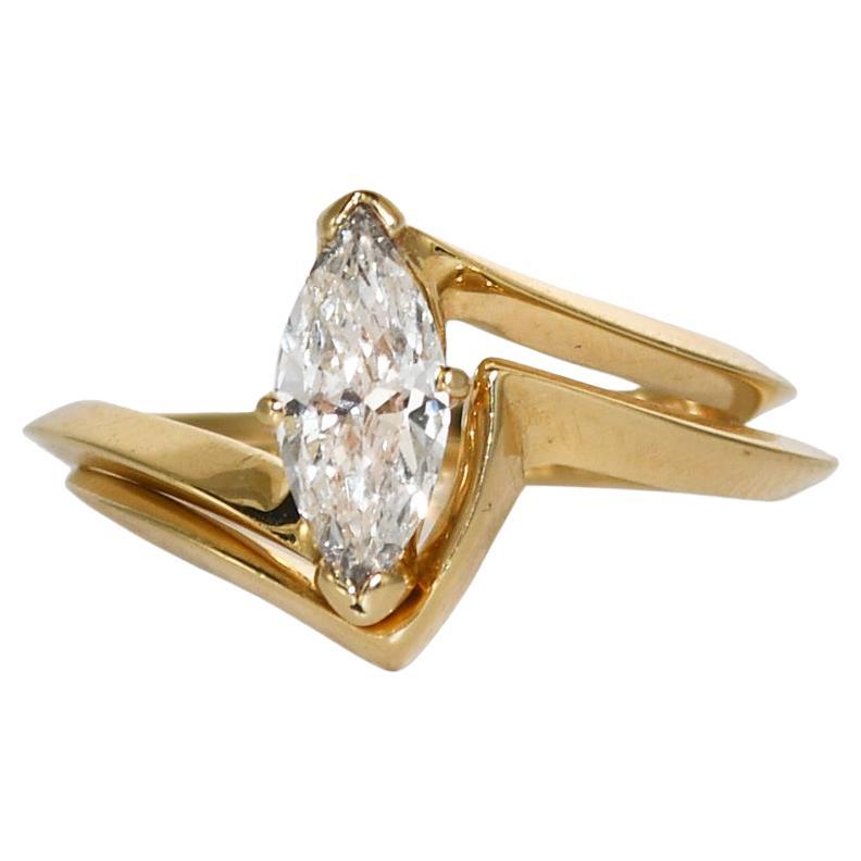 Bague et anneau en or jaune 14 carats serti de diamants marquises de 0,63 carat