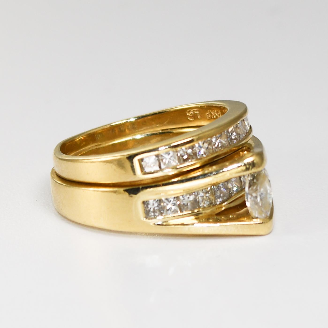 Ladies 14k yellow gold and diamond wedding ring set.
Stamped 14kp and weighs 9.1 grams gross weight.
The center stone is a marquise shape diamond, .30 carats, H to I color, Si clarity. 
The ring is a size 7.