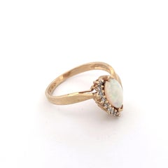 Vintage 14K Yellow Gold Marquise Opal and Diamond Bypass Ring (bague de contournement en or jaune)
