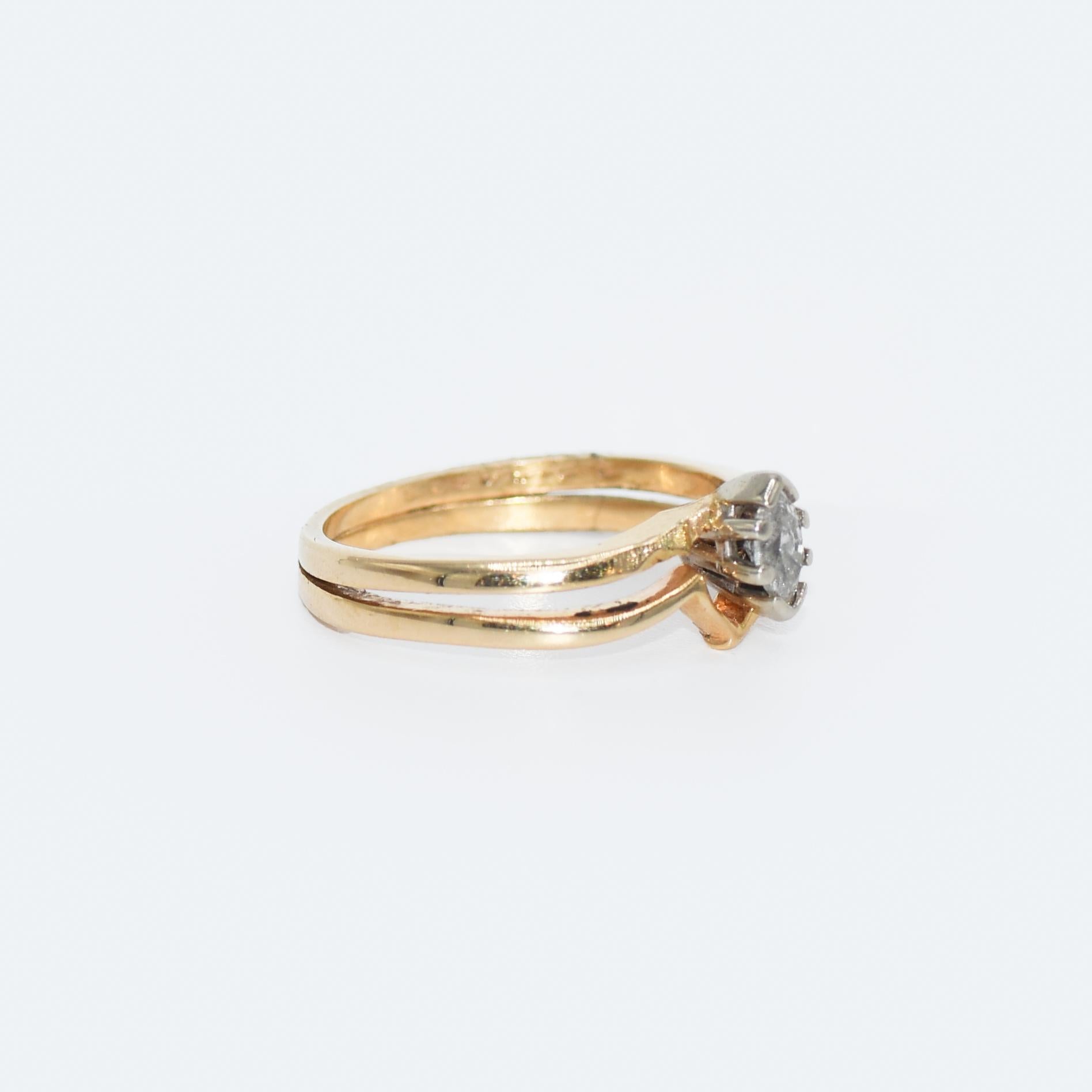 Marquise diamond solitaire ring in 14k yellow gold.
Stamped 14k and weighs 3.2 grams.
The marquise shaped diamond is H to i color, Si clarity, .20 carats.
The ring size is 6 3/4 and can be sized.
Very good condition.