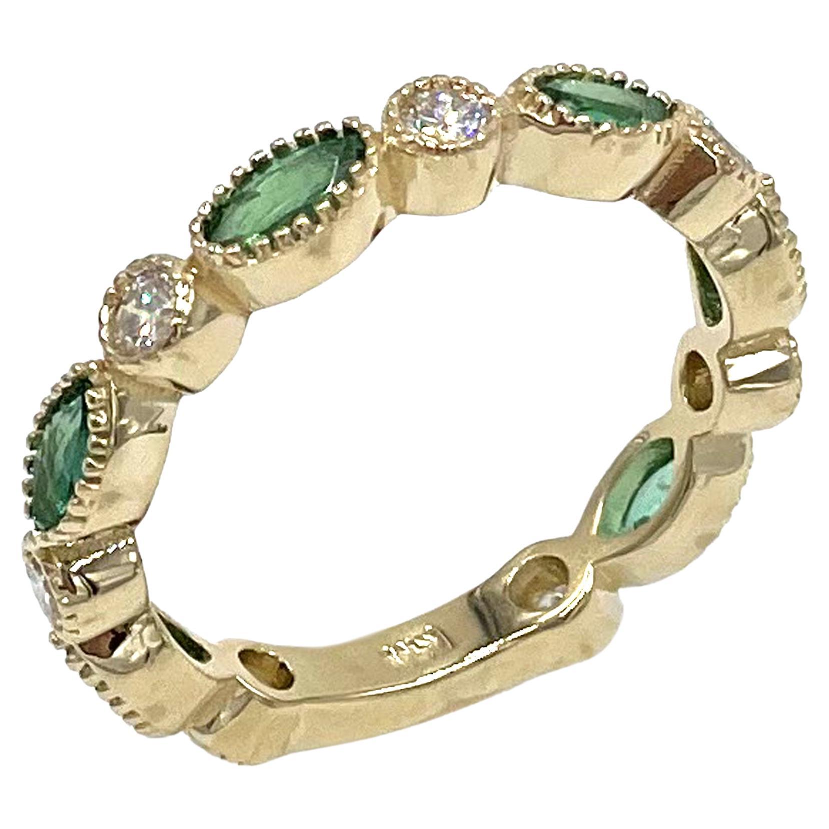 14K Yellow Gold Marquise Shaped Emerald and Diamond Eternity Ring