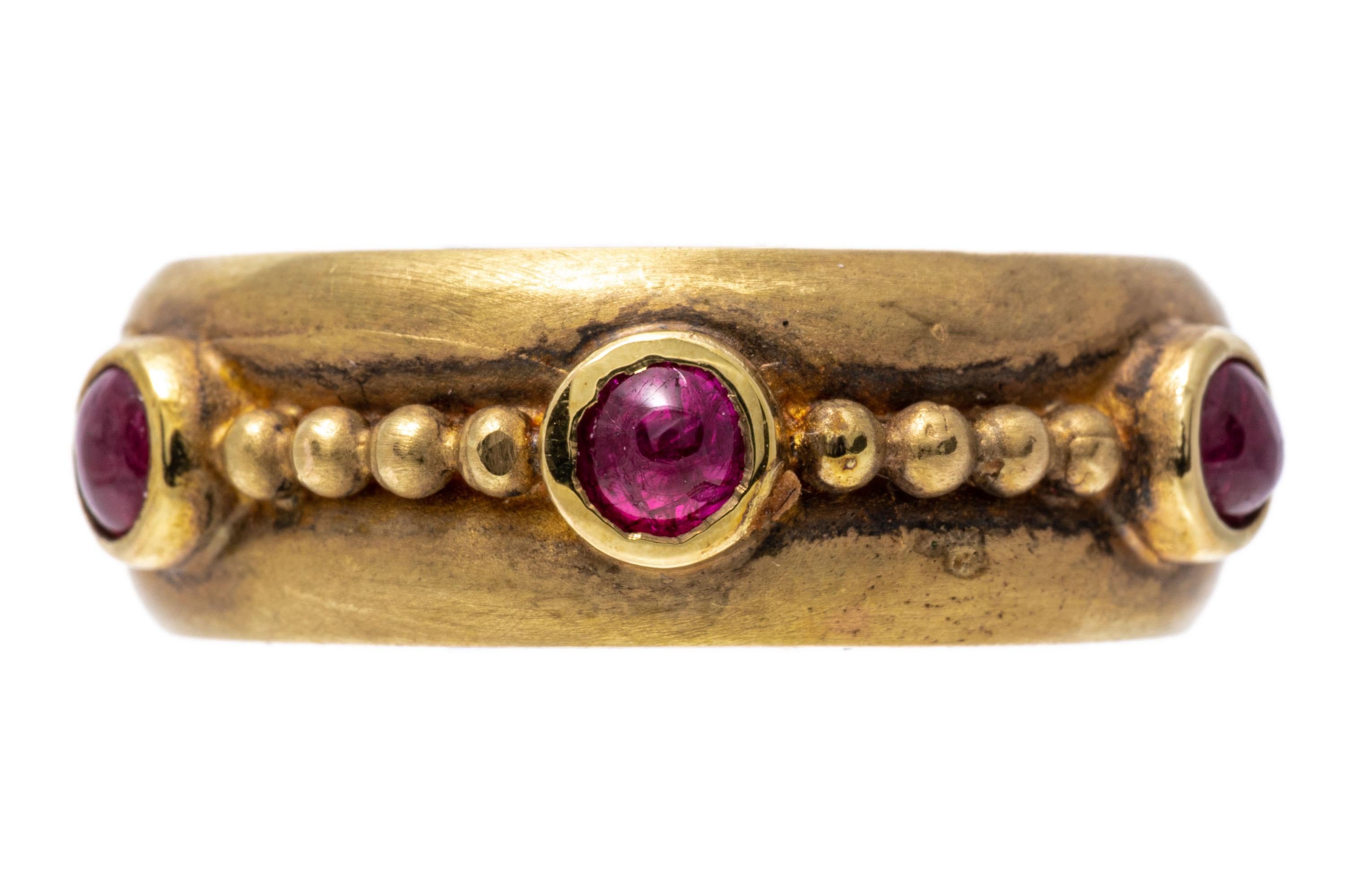 Women's 14k Yellow Gold Matte Finished Cabachon Synthetic Ruby Eternity Band For Sale