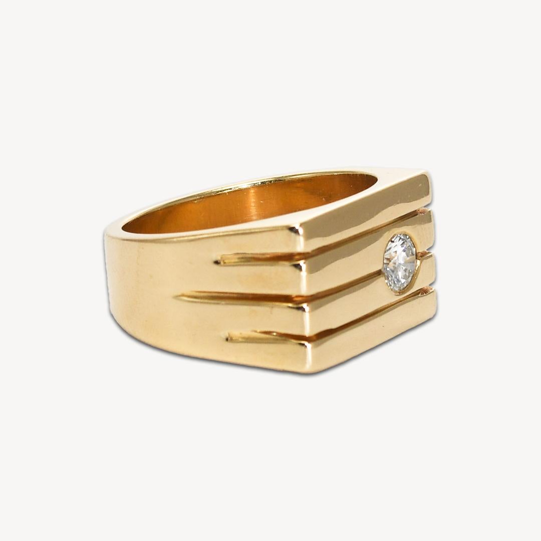 Men's 14k yellow gold and diamond ring. 
Stamped 14k and weighs 11.7 grams.
The diamond is a round brilliant cut, H to I color, Si clarity, and 0.25 carats.
The top of the ring measures 10.5mm wide.
Ring size is 7 1/2 and can be sized up to 9 1/2 or