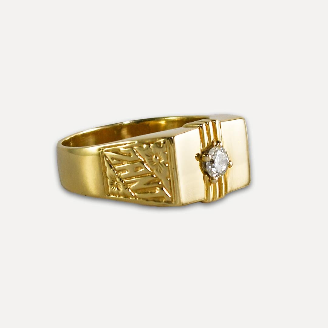 Men's 14k yellow ring with diamond.
Stamped 14k and weighs 12.8 grams.
The diamond is a round brilliant cut, approximately .35 carats, H to I color, and Si2 clarity.
There is an engraving on the sides, 1 Mil Sales and the other side Zant.
The top of