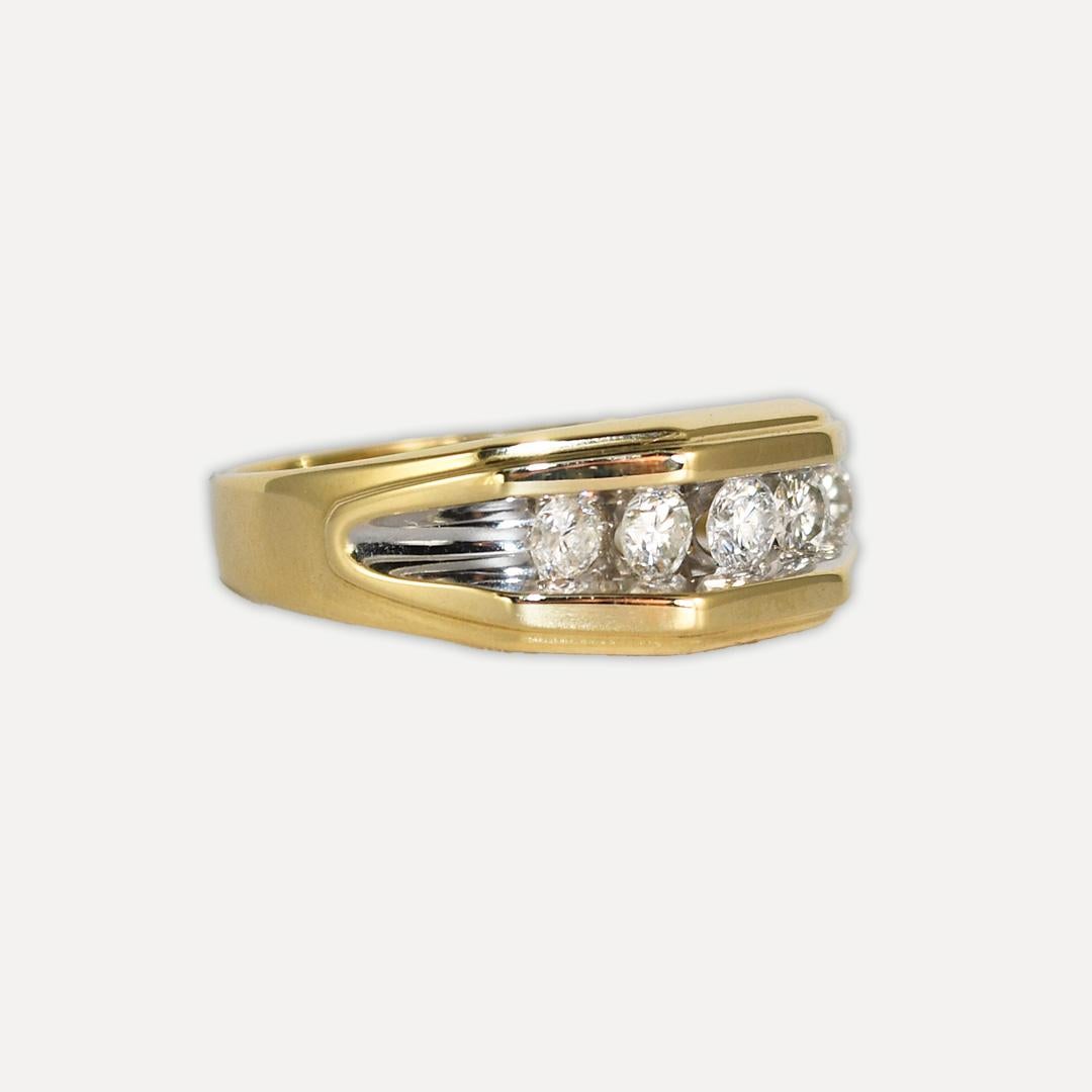 Men's diamond band with 14k yellow gold setting.
Tests 14k and weighs 6.6 grams gross weight.
There are five round brilliant diamonds, H, i, and J color range, Si to i1 clarity, good cuts, and 0.65 total carats.
The top of the ring measures 8.7mm