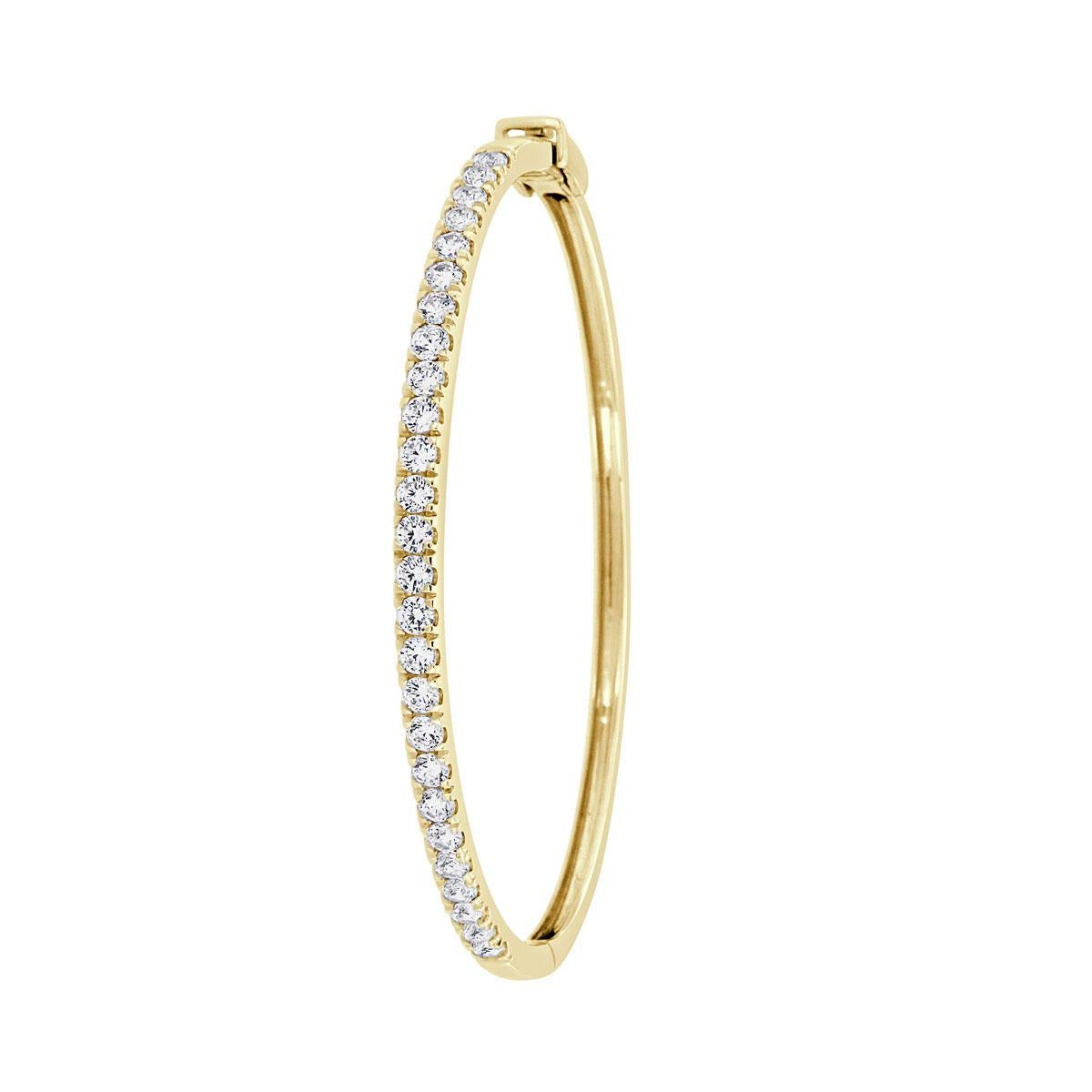 This classic bangle features round brilliant diamonds micro-prong -set for maximum brilliance. Experience the difference!

Product details: 

Center Gemstone Type: NATURAL DIAMOND
Center Gemstone Color: WHITE
Center Gemstone Shape: ROUND
Center