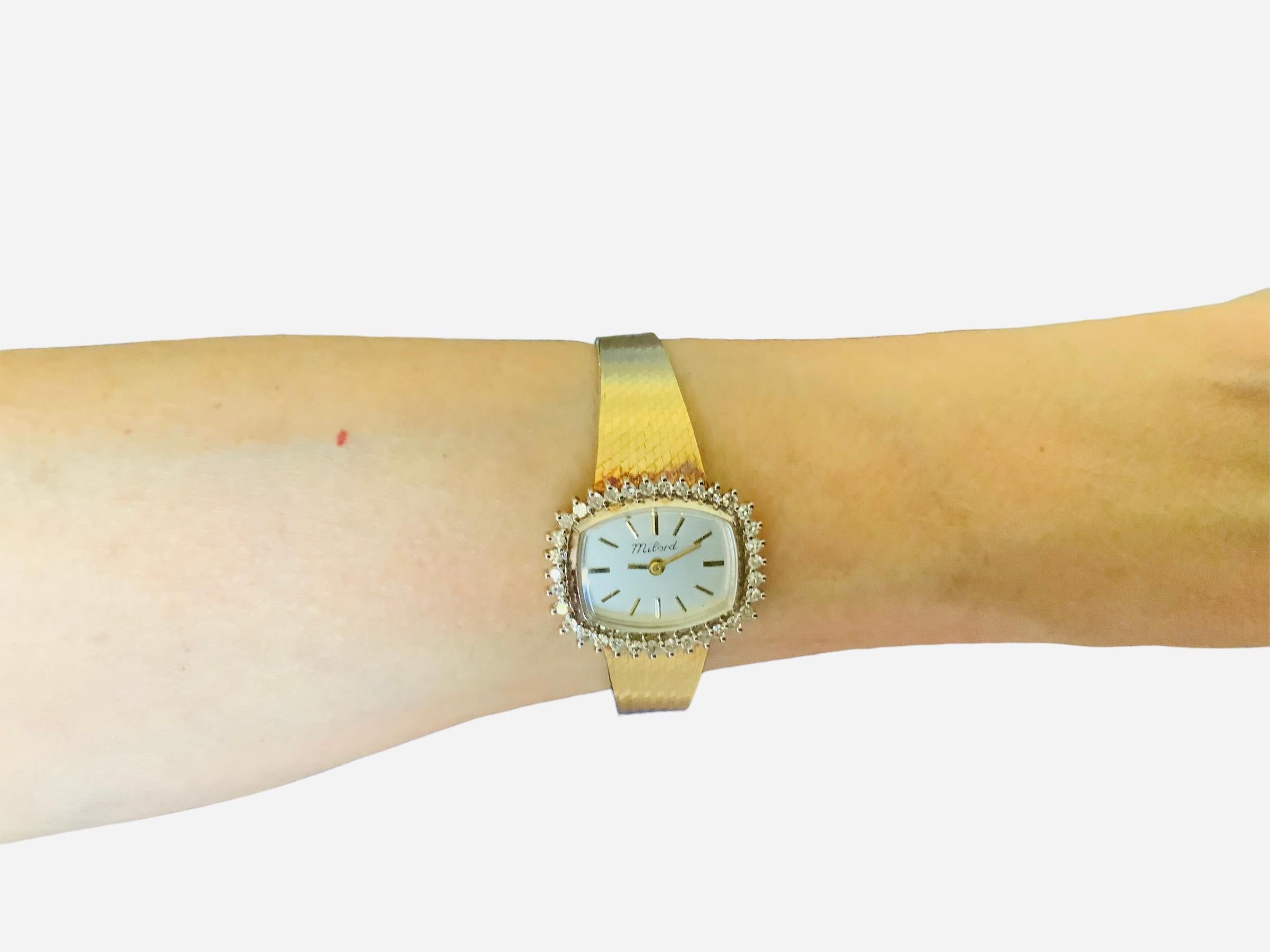 Montre-bracelet pour femmes en or jaune 14K Milord en vente 10