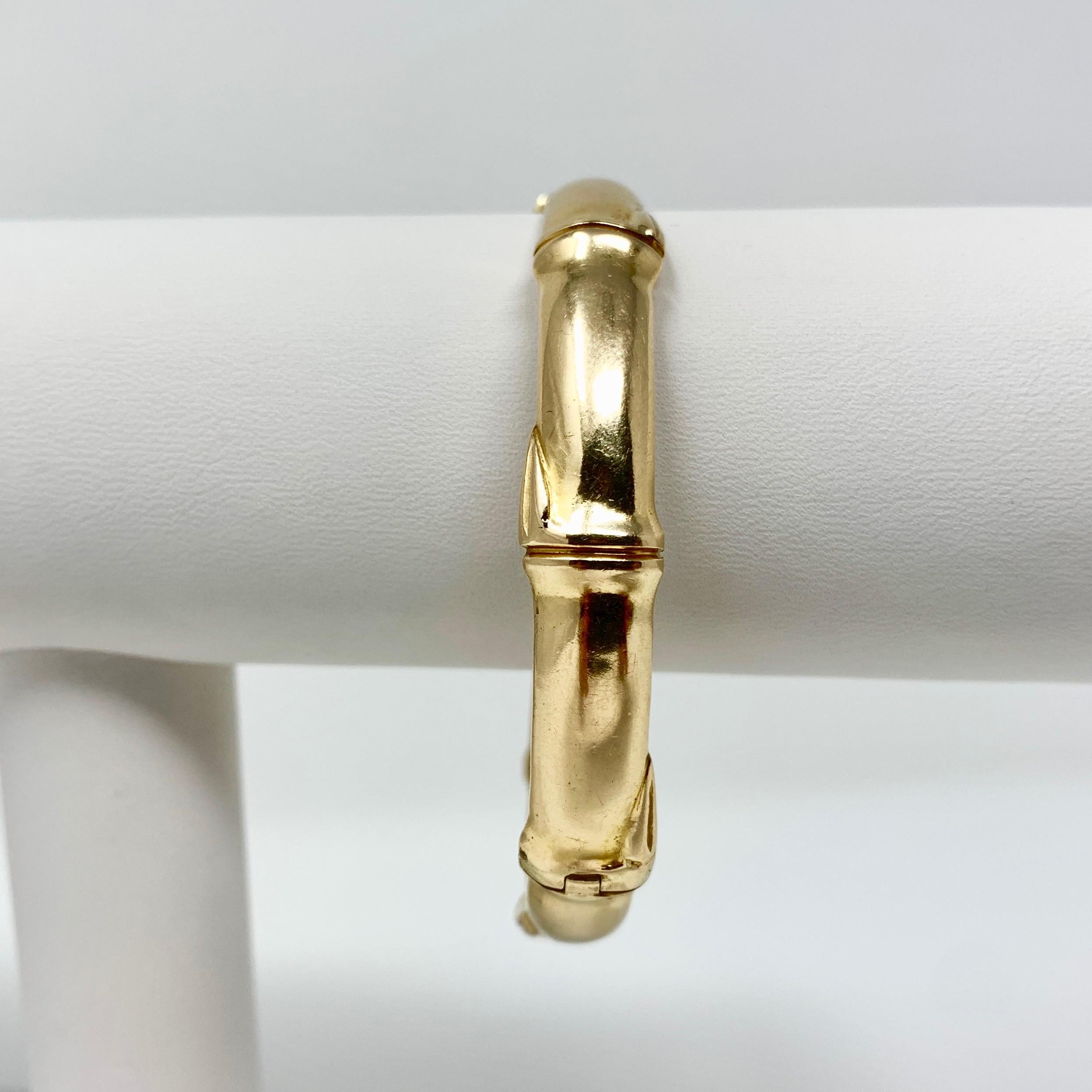 14k Yellow Gold Vintage Ming's Hawaii HK Bamboo Bangle Bracelet 7.5 Inches

Condition:  Very Good Condition, Professionally Cleaned and Polished
Metal:  14k Gold (Marked, and Professionally Tested)
Weight:  21.6g
Length:  7.5 Inches Inner
