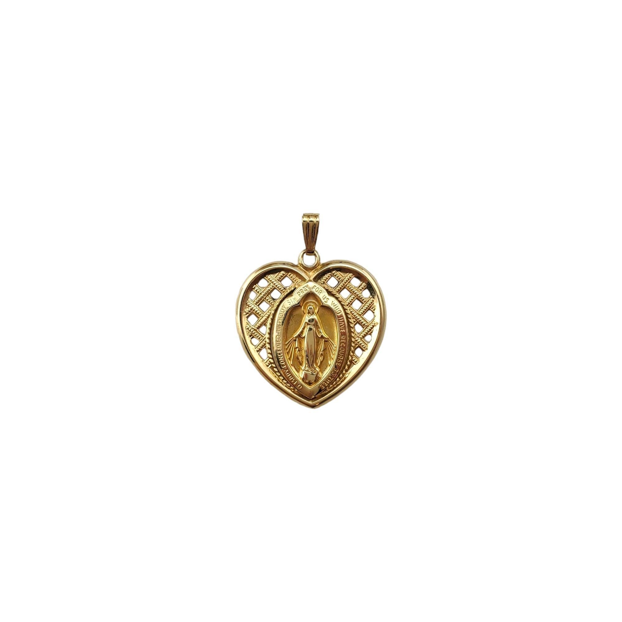 Vintage 14K Yellow Gold Miracle of the Miraculous Heart Pendant 

