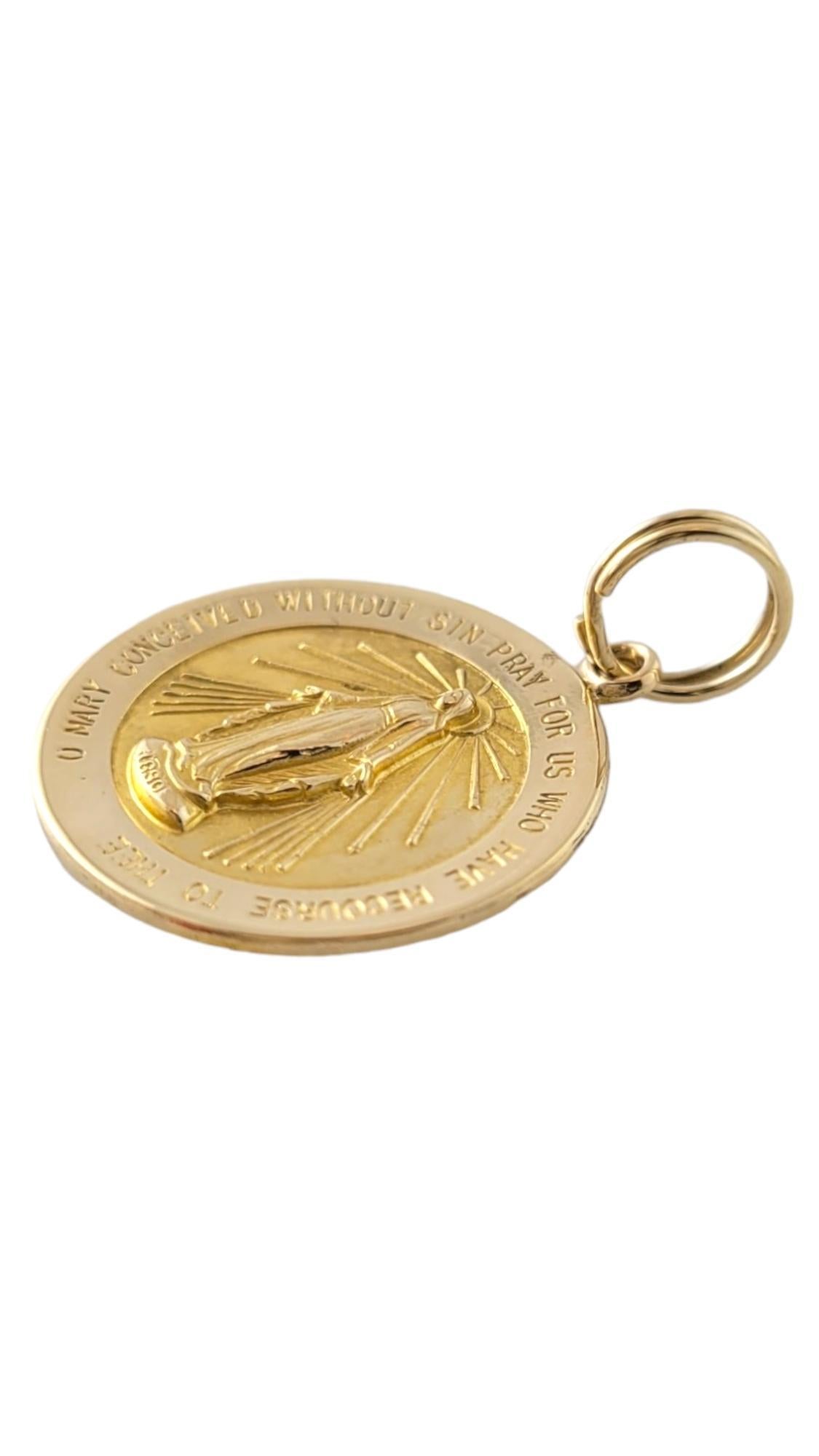 14K Yellow Gold Miraculous Mary Pendant #16879

This beautiful 14K yellow gold Miraculous Mary pendant is perfect for you!

Size: 23.6mm X 20.7mm X 1.2mm

Weight: 1.8 dwt/ 2.8 g

Hallmark: 14K

Very good condition, professionally polished.

Will