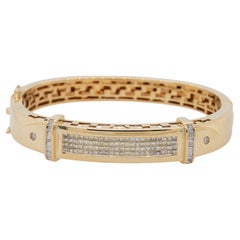 Bracelet jonc en or jaune 14 carats avec diamants tailles mixtes