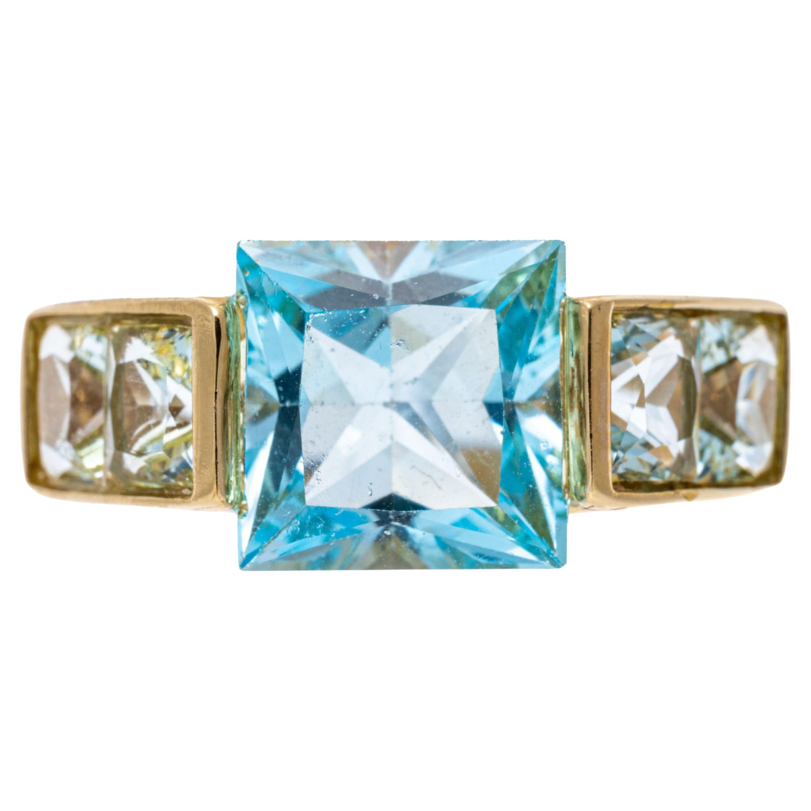 14k Yellow Gold Modern Square Blue Topaz Channel Set Ring For Sale