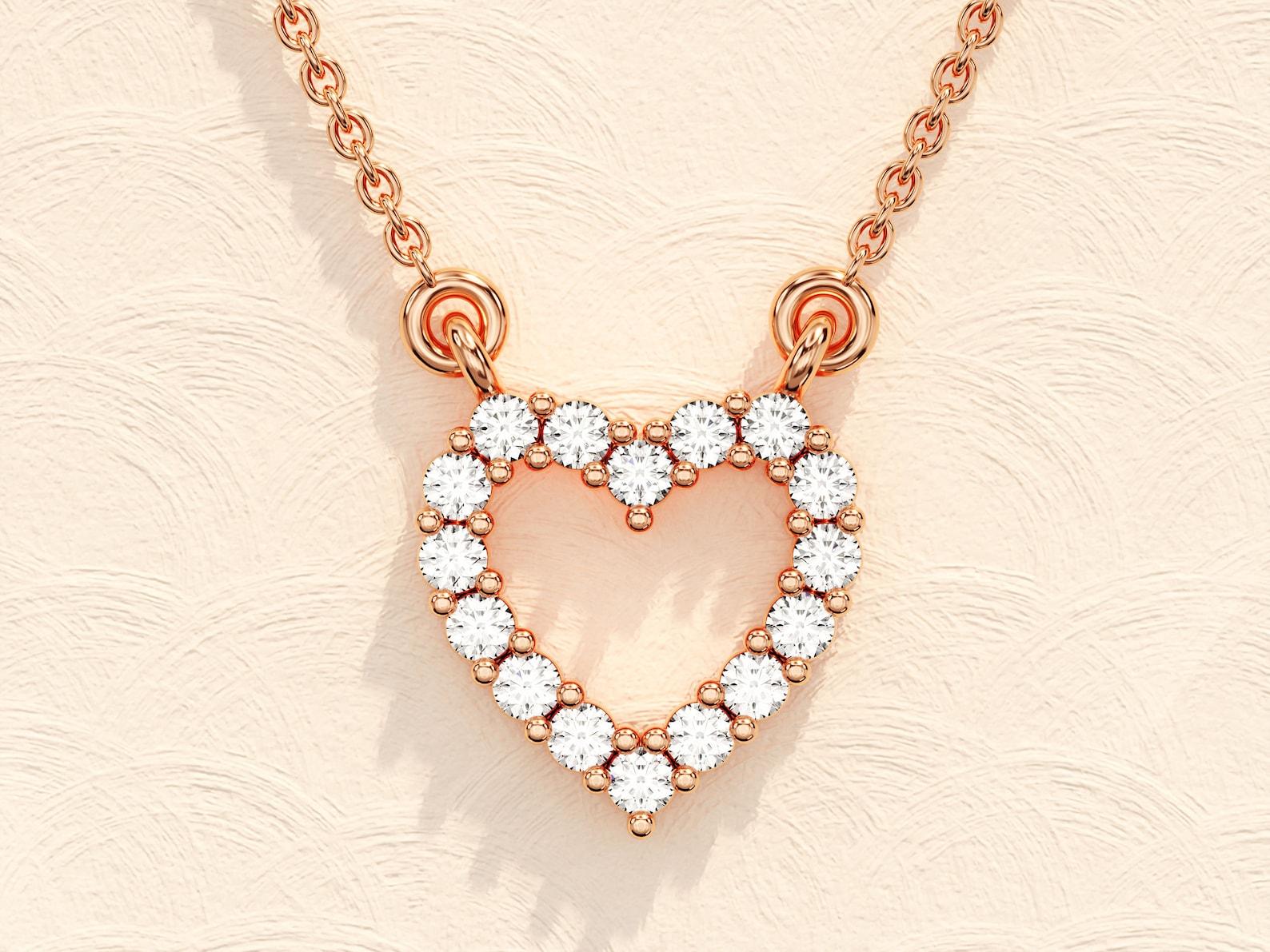 Moissanite Heart Necklace Anniversary Gift For Women.
Purity- solid  14k Yellow Gold 
Gemstone: Moissanite
Style: Minimalist
Necklace Length: 14 Inches - 20 Inches
Gemstone Cut: Round
Pendant width: 9.90 Millimetres
Pendant height: 9.90