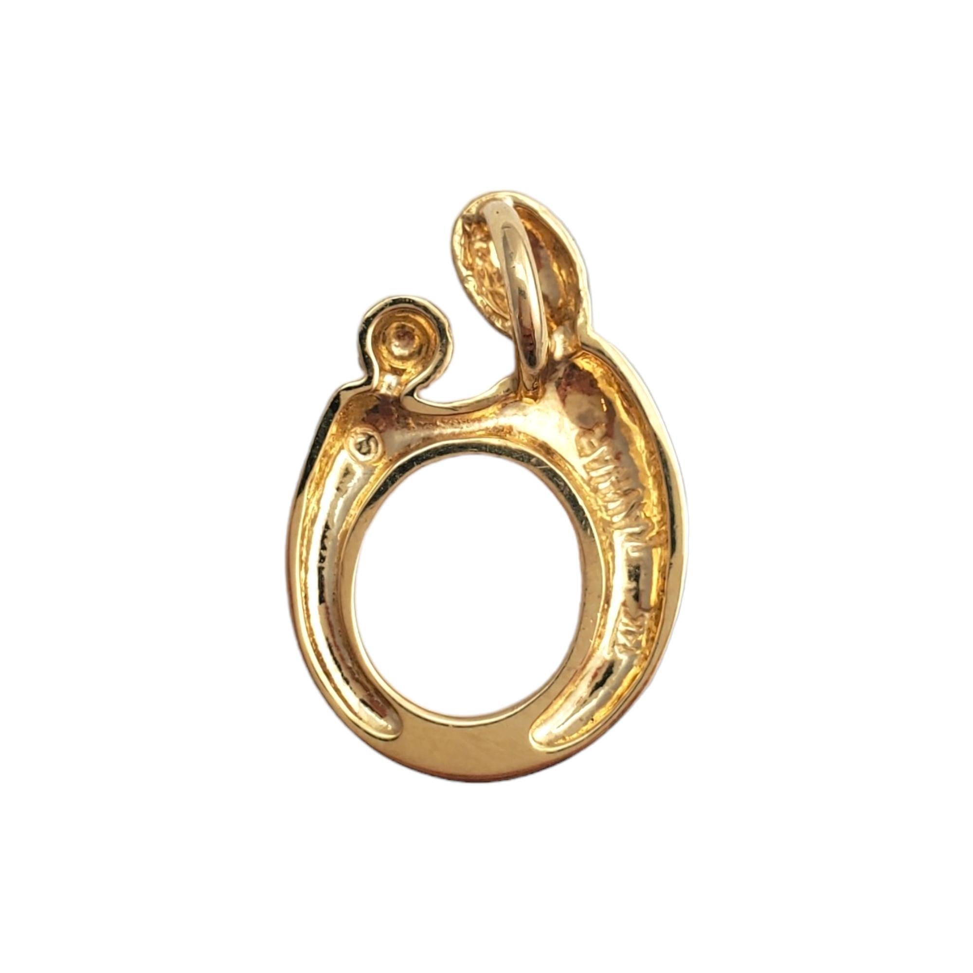 Vintage 14 karat yellow gold mother & child pendant -

Celebrate the unbreakable bond between a mother and child with this pendant that is beautifully crafted in 14K yellow gold. 

Size: 20.6mm x 2.5mm

Stamped: 14K

Weight: 2.0 gr./ 1.2 dwt.

Chain