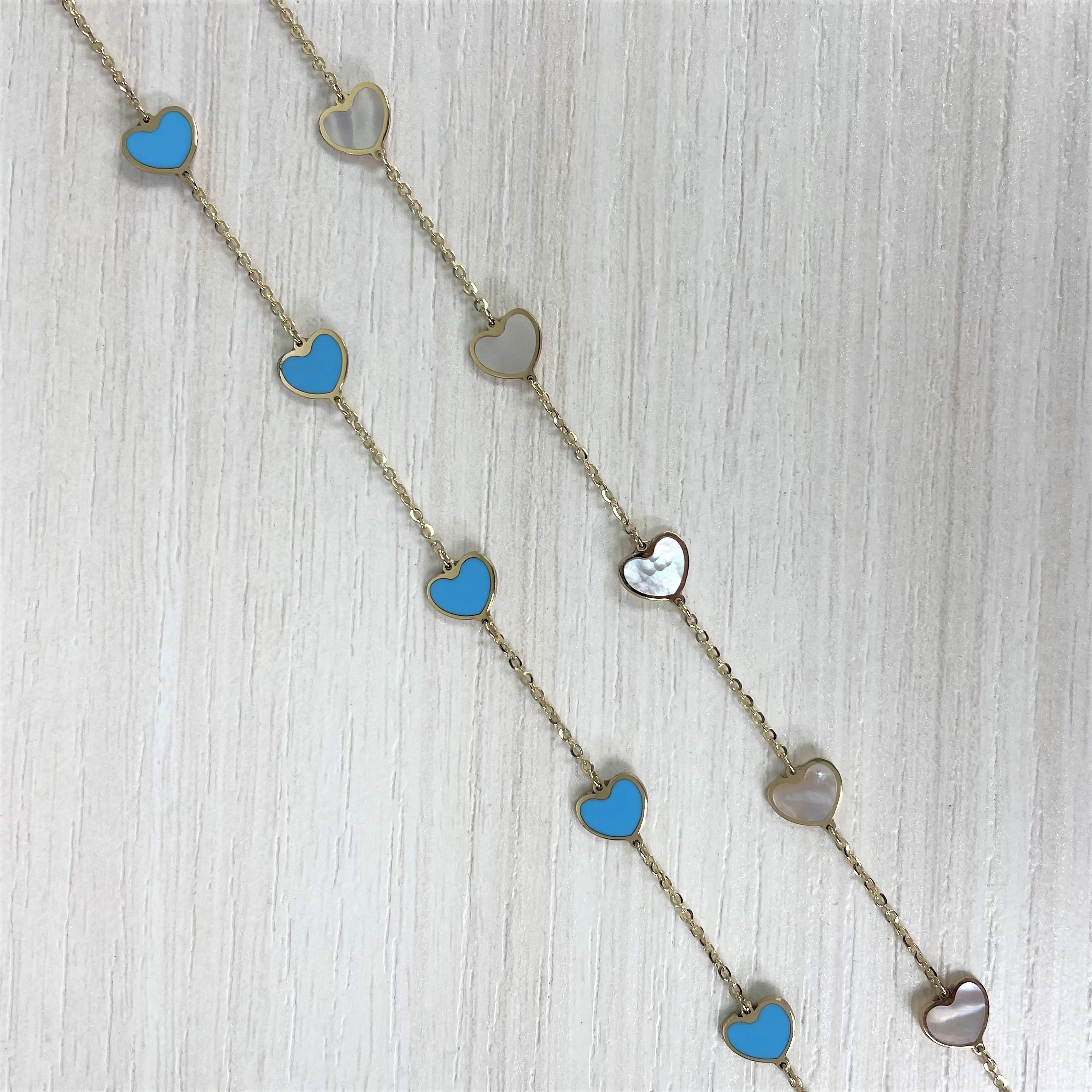 Quality Gemstone Clover Necklace: Focused on design and detail, this beautiful colored gemstone necklace features a station design and is crafted of 14k yellow gold. Necklace measurement is 18