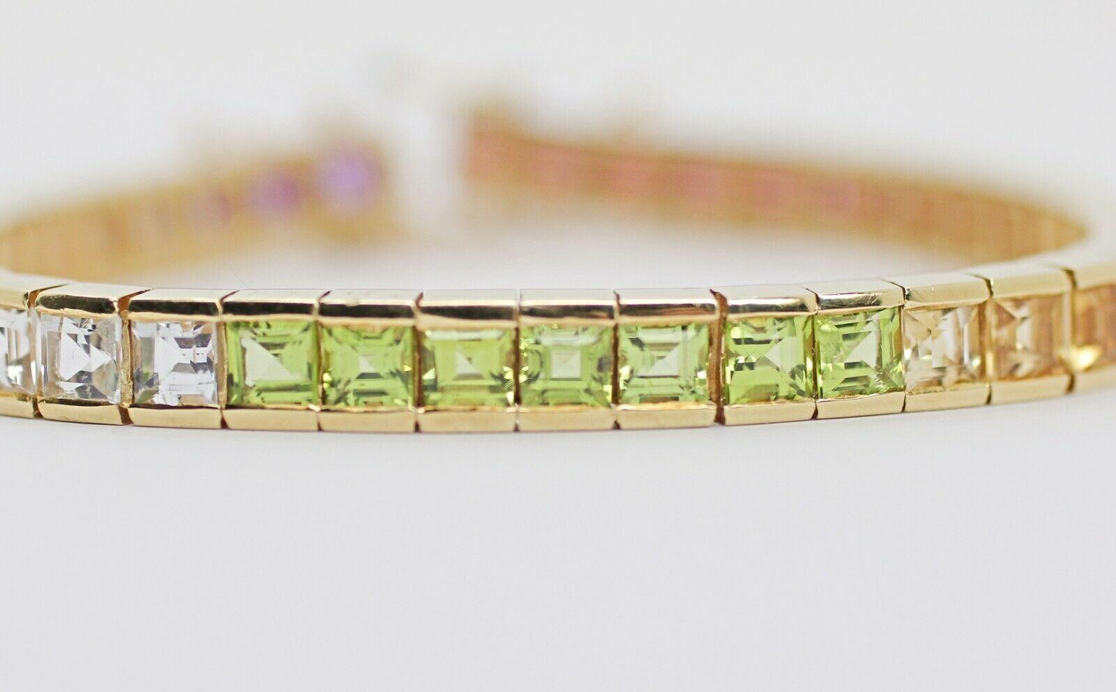  Specifications:    stone: 9PCS PURPLE AMETHYST/ 7PCS WHITE TOPAZ/ 7PCS GREEN PERIDOT / 9PCS ORANGE CITRINE/ 10PCS RED GARNET
    STONE MEASUREMENT: APPROX 4.01MM X 3.6MM
    brand: UNBRANDED
    metal: 14K YELLOW GOLD
    type: TENNIS BRACELET
   