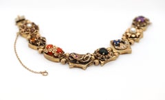 Bracelet en or jaune 14K à breloques multiples Perles Rubis Saphirs, 1930
