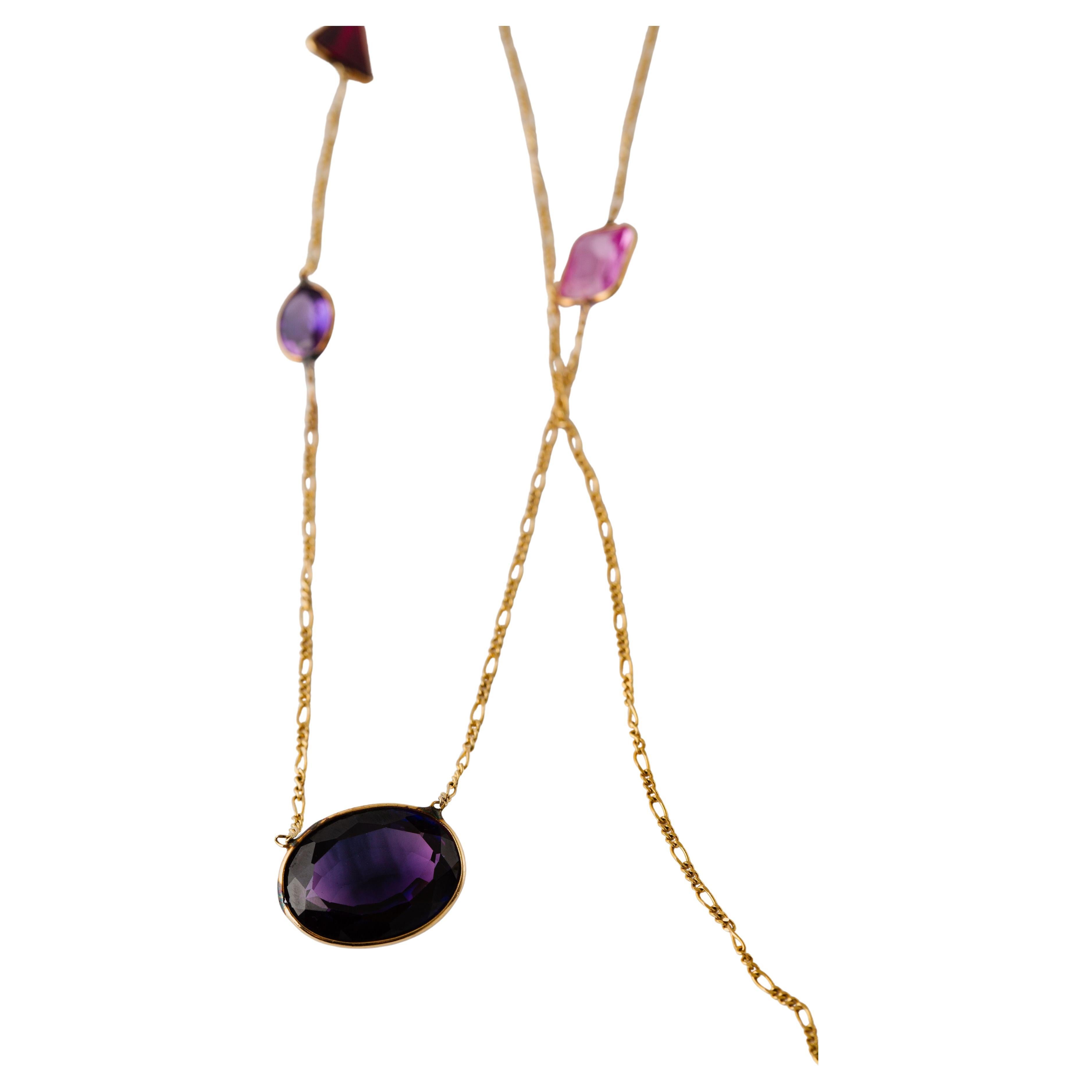 Material: 14k Yellow Gold
Gemstone: Lab Created Amethyst, Ruby, Peridot, Citrine, Pink Sapphire
Center gemstone dimensions 21.5 mm x 16.2 mm x 7.5 mm
Length: 32.5 inches
Weight: 14.4 grams