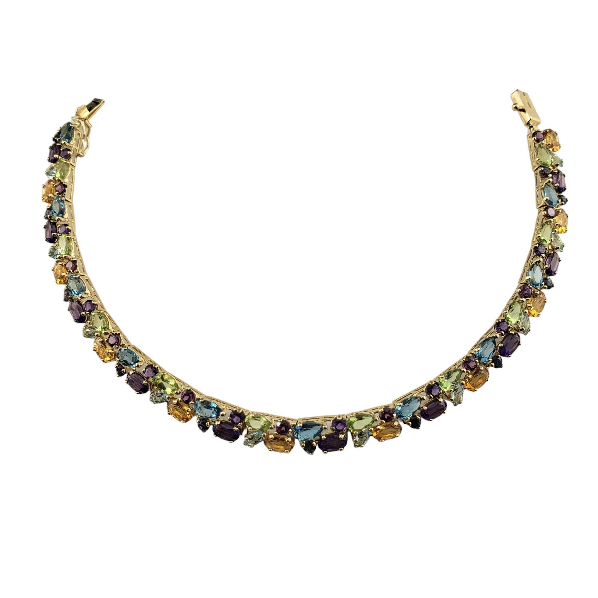 Vintage 14K Yellow Gold Gemstone Bracelet 

This stunning bracelet features 20 blue topaz, 20 amethysts, 10 peridots, 10 citrines, 10 garnets, and 10 blue sapphires set in classic 14K yellow gold.  Width: 6 mm.

Total topaz weight: 3.30 ct.

Total