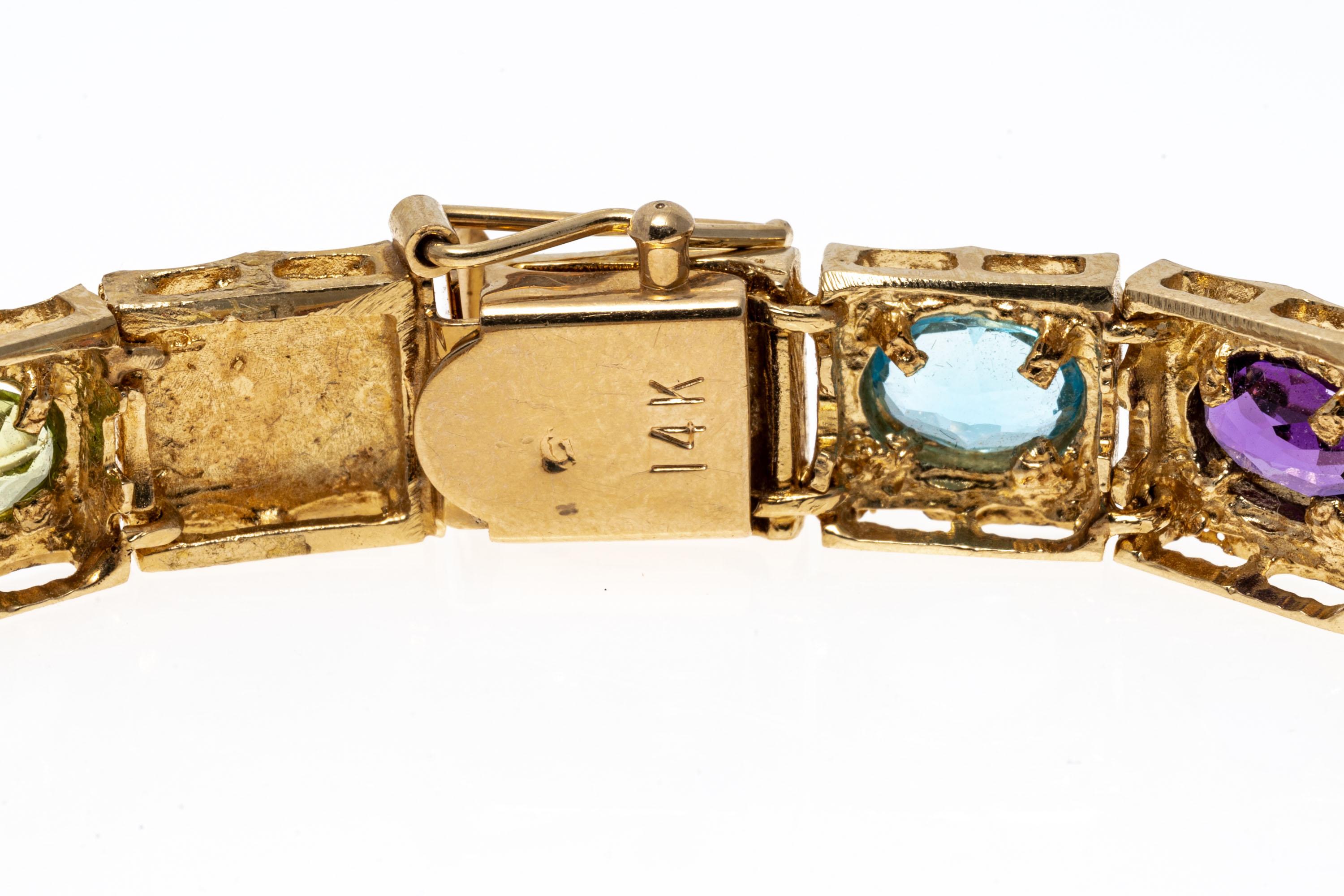 Armband aus 14 Karat Gelbgold mit Citrin, Amethyst, blauem Topas, Granat und Peridot (Ovalschliff) im Angebot