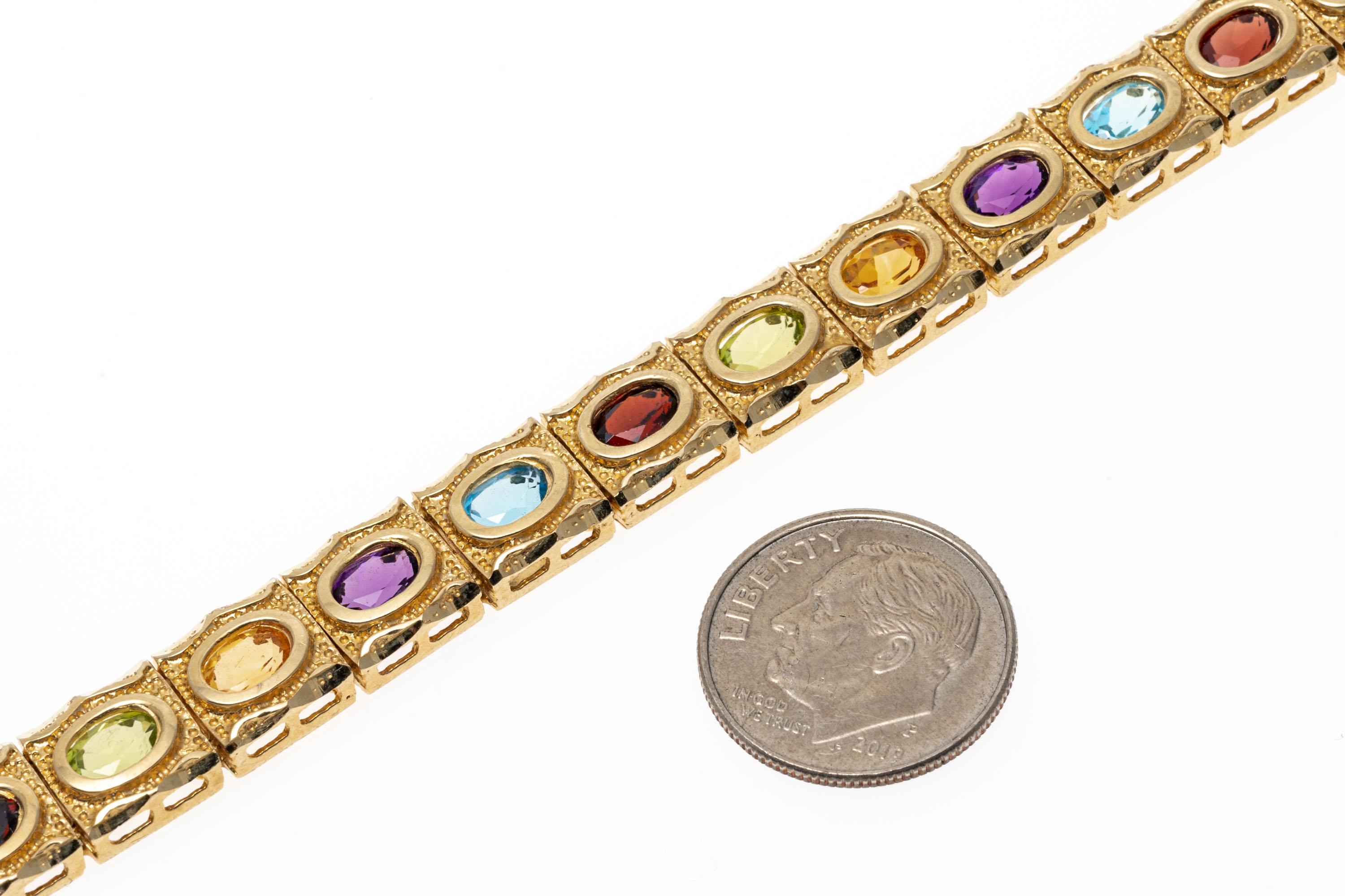 Armband aus 14 Karat Gelbgold mit Citrin, Amethyst, blauem Topas, Granat und Peridot im Zustand „Gut“ im Angebot in Southport, CT