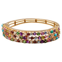 Breites 14k Gelbgold-Armband mit mehreren Edelsteinen