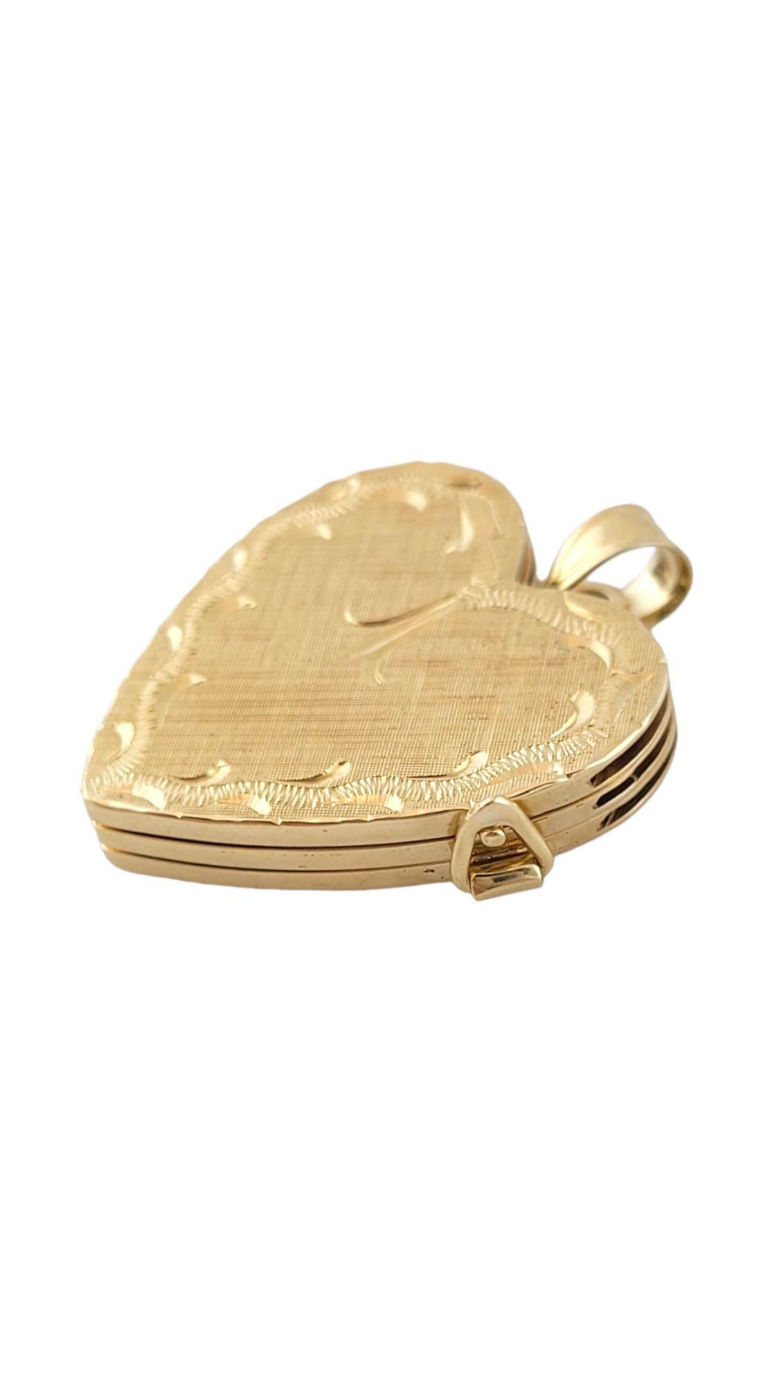 Vintage 14K Yellow Gold Multi Layer Heart Locket

This gorgeous 14K gold heart locket has 3 different layers to allow you to add more photos into your locket!

Size: 25.12mm X 25.98mm X 4.29

Length w/ bail: 30.9mm

Weight: 8.34 g/ 5.4