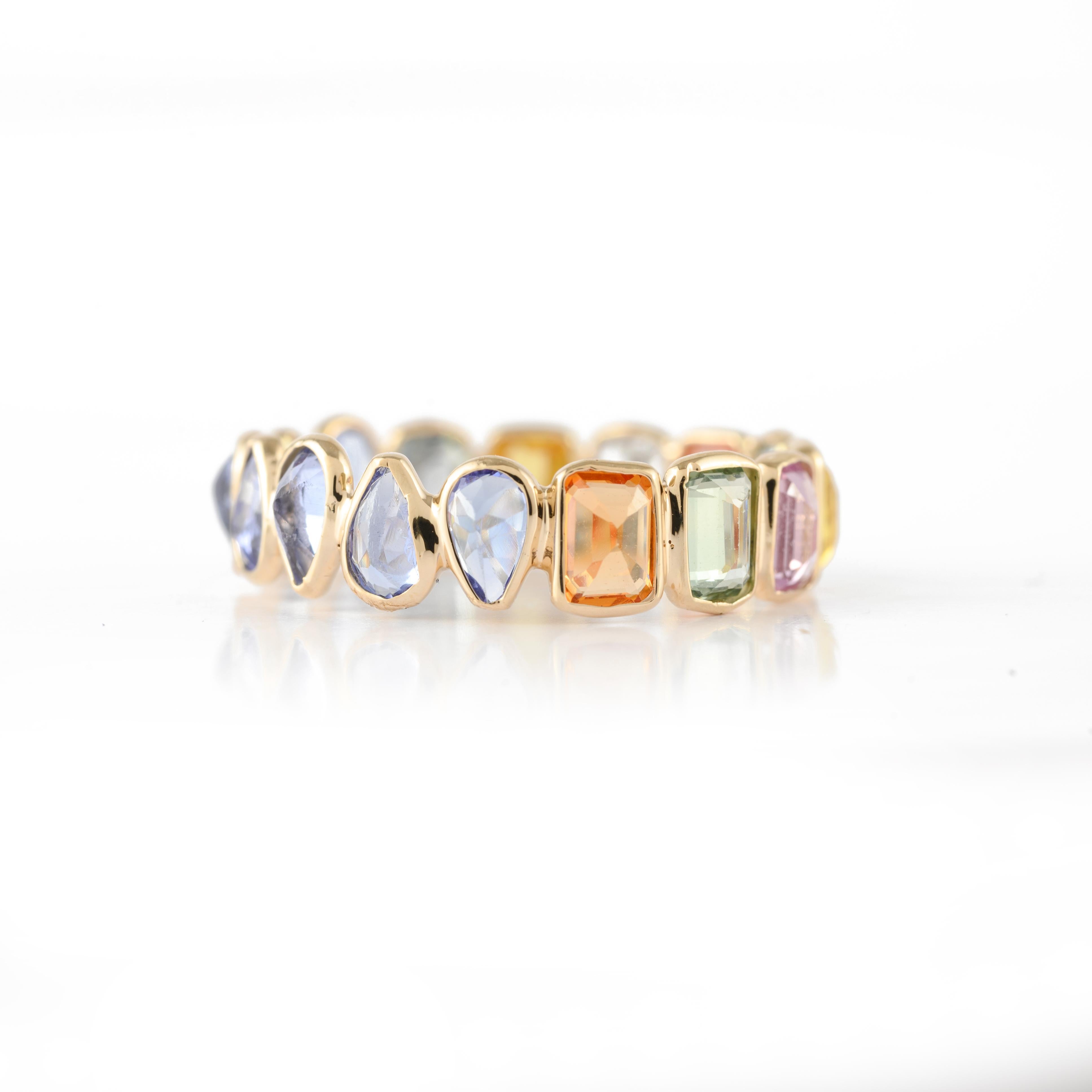 For Sale:  14k Yellow Gold Multi Sapphire and Tanzanite Two-in-one Eternity Band Ring 7