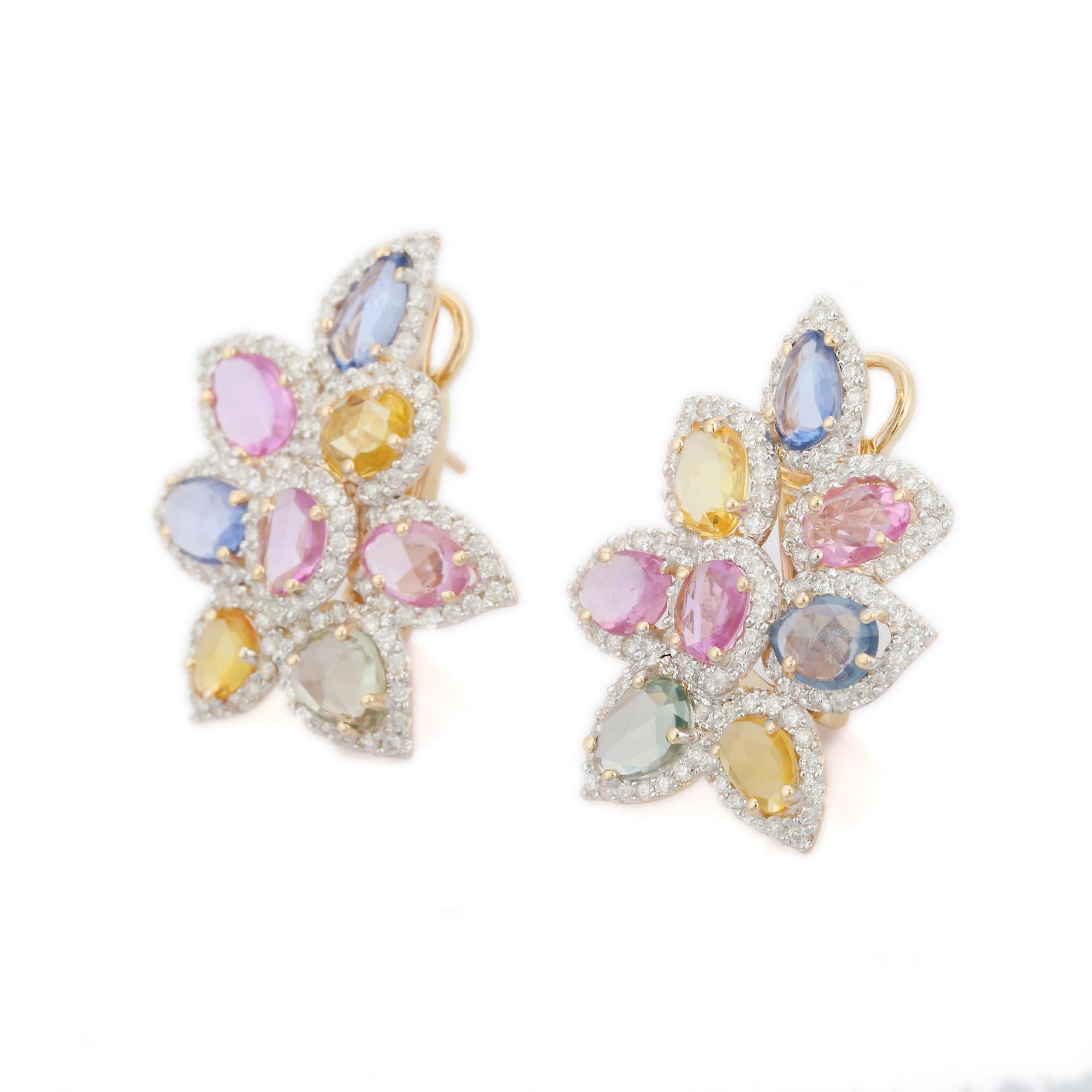 Multi Sapphire and Diamond Studded Floral Stud Earrings in 14K Gold to make a statement with your look. You shall need stud earrings to make a statement with your look. These earrings create a sparkling, luxurious look featuring uneven cut multi