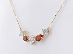 14K Yellow Gold Multi-Shape Garnet and Diamond Geometric Curved Drop Necklace