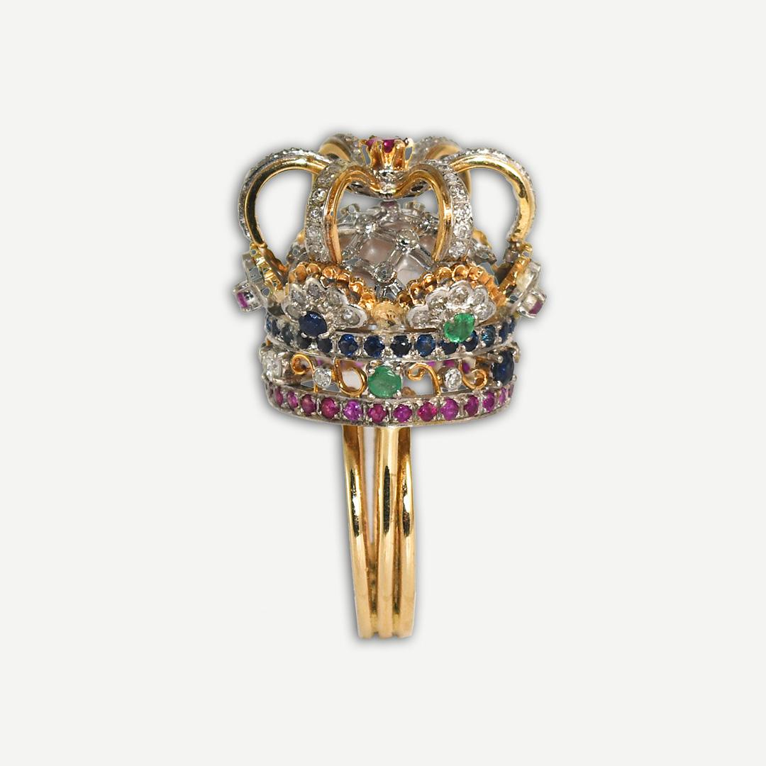 14k yellow gold multi-stone crown ring. 
Set with diamonds, rubies, sapphires, emeralds, red spinel, and mother of pearl. 
2.50TCW
Very detailed with amazing craftsmanship. 
Stamped 585, tests 14k.
weighs 17.6 grams
Size 7, can be sized up or down