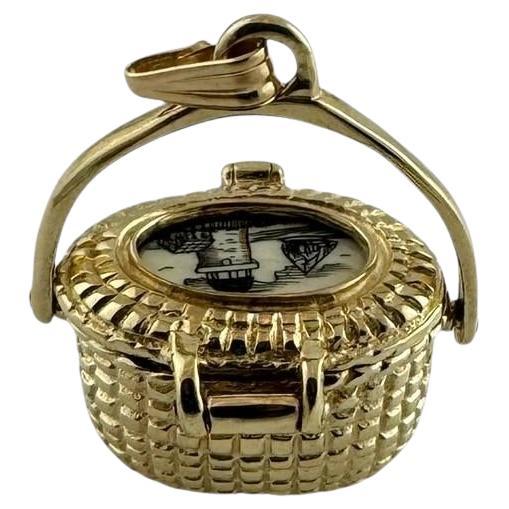 18K Yellow Gold Nantucket Basket Charm Pendant

This sweet Nantucket basket charm is set in 18K yellow Gold.

Top opens and closes tight.

Charm is approx. 24mm in length, 22.5 mm in width, and 13.5 mm in height

Stamped PAI 14K

Weighs 9.5 g / 6.13