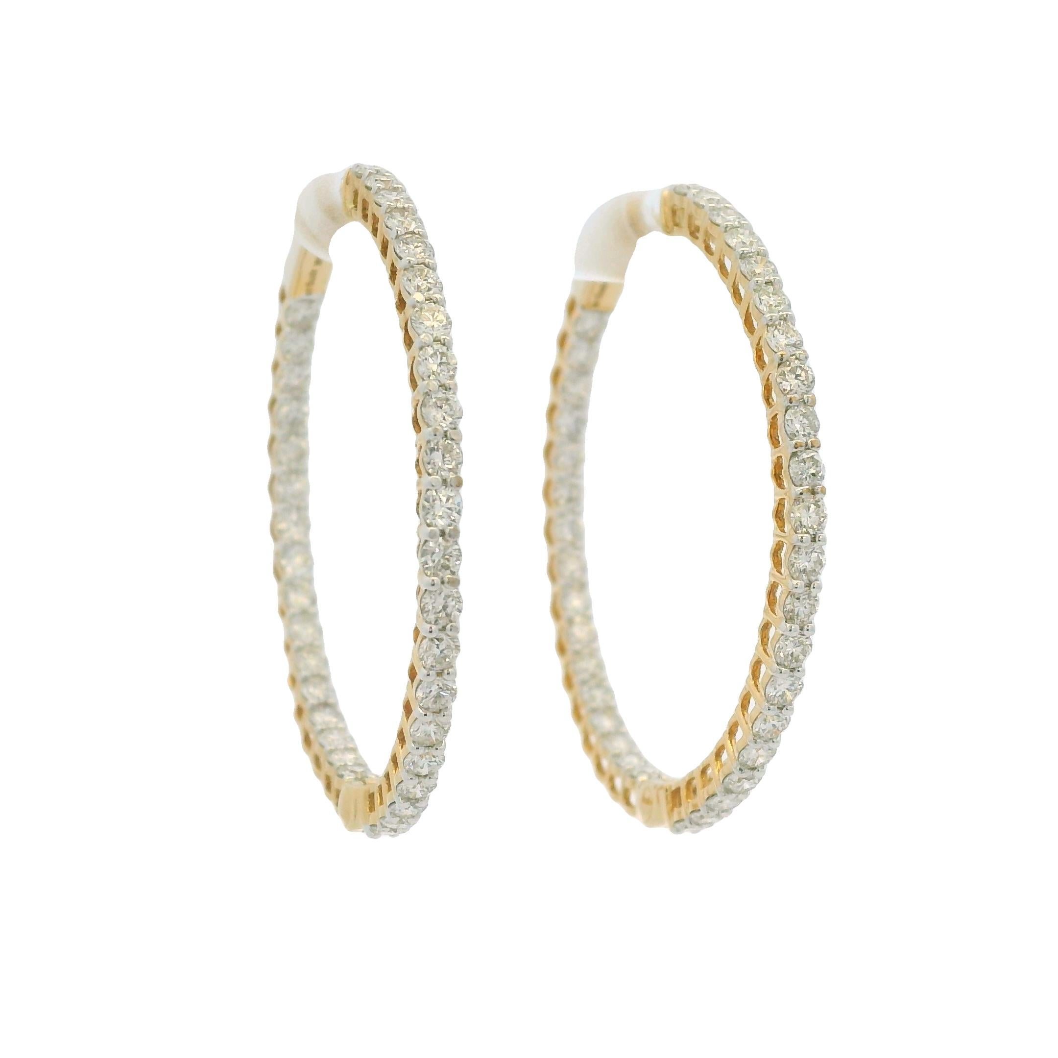 14k Yellow Gold Natural 2.35 Carat Diamond Inside-Out Hoop Earrings
Product: Natural Diamond Hoop Earrings
Material: 14k Yellow Gold
Diamond Details: There are approximately 2.35 carats of round brilliant-cut diamonds
Diamond Clarity: All diamonds