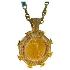 14k gold frame, center gold coin