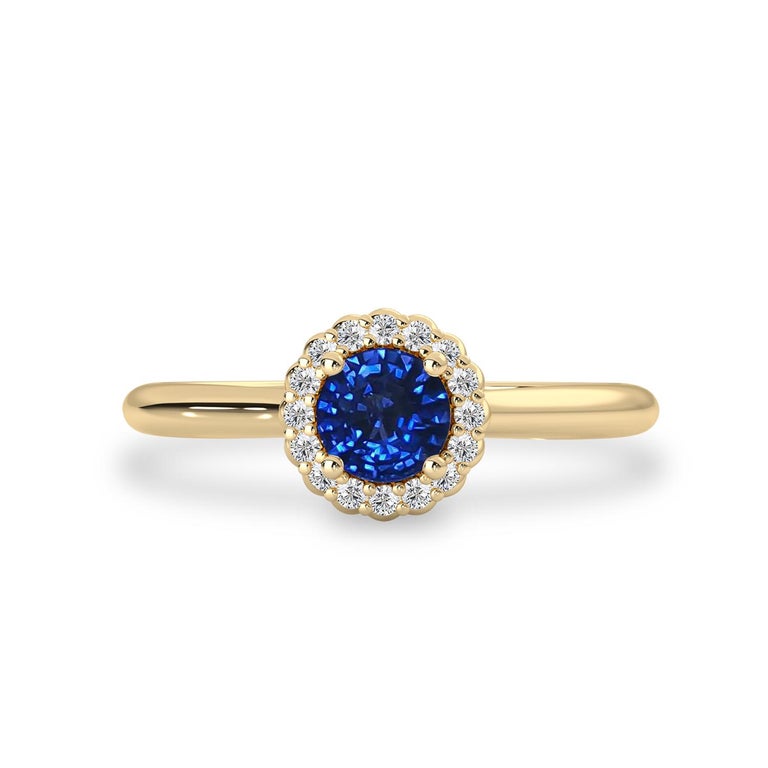 14k Yellow Gold Genuine Blue Sapphire Oval & Diamond Halo Twist Ring 14k Yellow Gold Genuine Blue Sapphire Oval & Diamond Halo Twist Ring