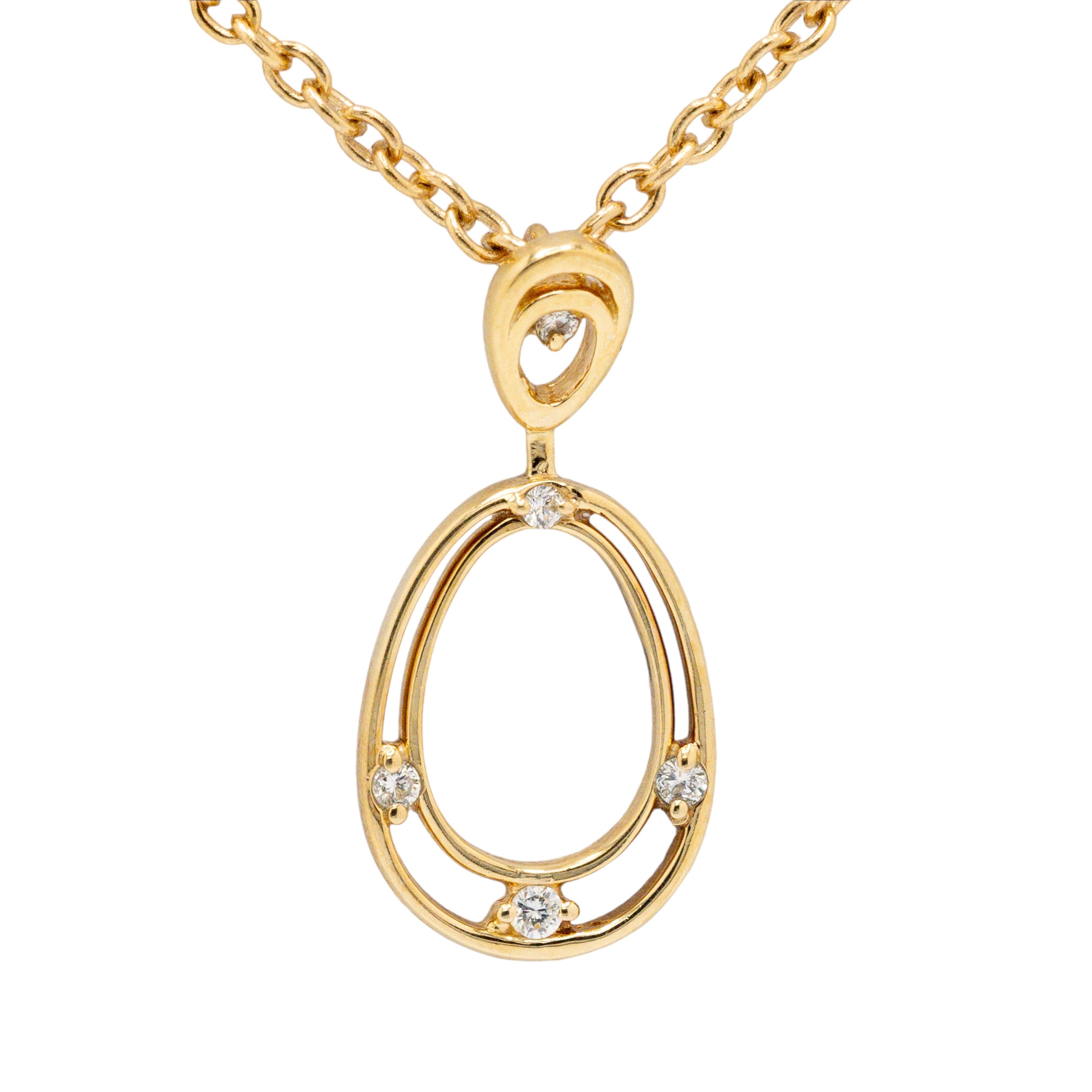 This timeless 14K Yellow Gold Chain Necklace features an elegant Oval Shaped Diamond Pendant with five carefully selected diamonds, totaling approximately 0.2 carats. Each diamond is set to maximize its brilliance, adding a refined sparkle to the