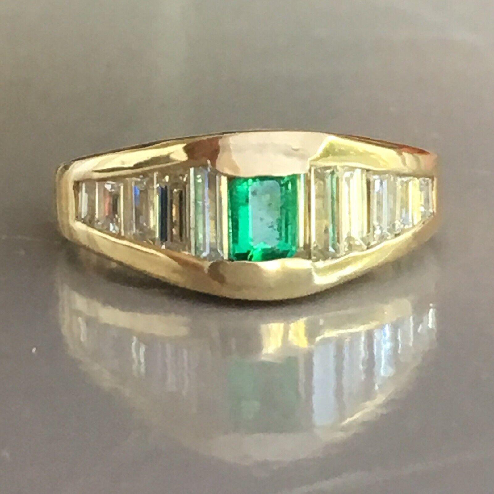 14K Yellow gold Lady's ring 
7.7 mm on top tapered down to 2.6 mm in bottom
One Emerald and Ten Baguette cut Diamonds

14K Yellow gold Lady's ring centered with a Natural earth mined Emerald, no enhancements, measuring 3.2 mm 4.0 mm 2.2 mm