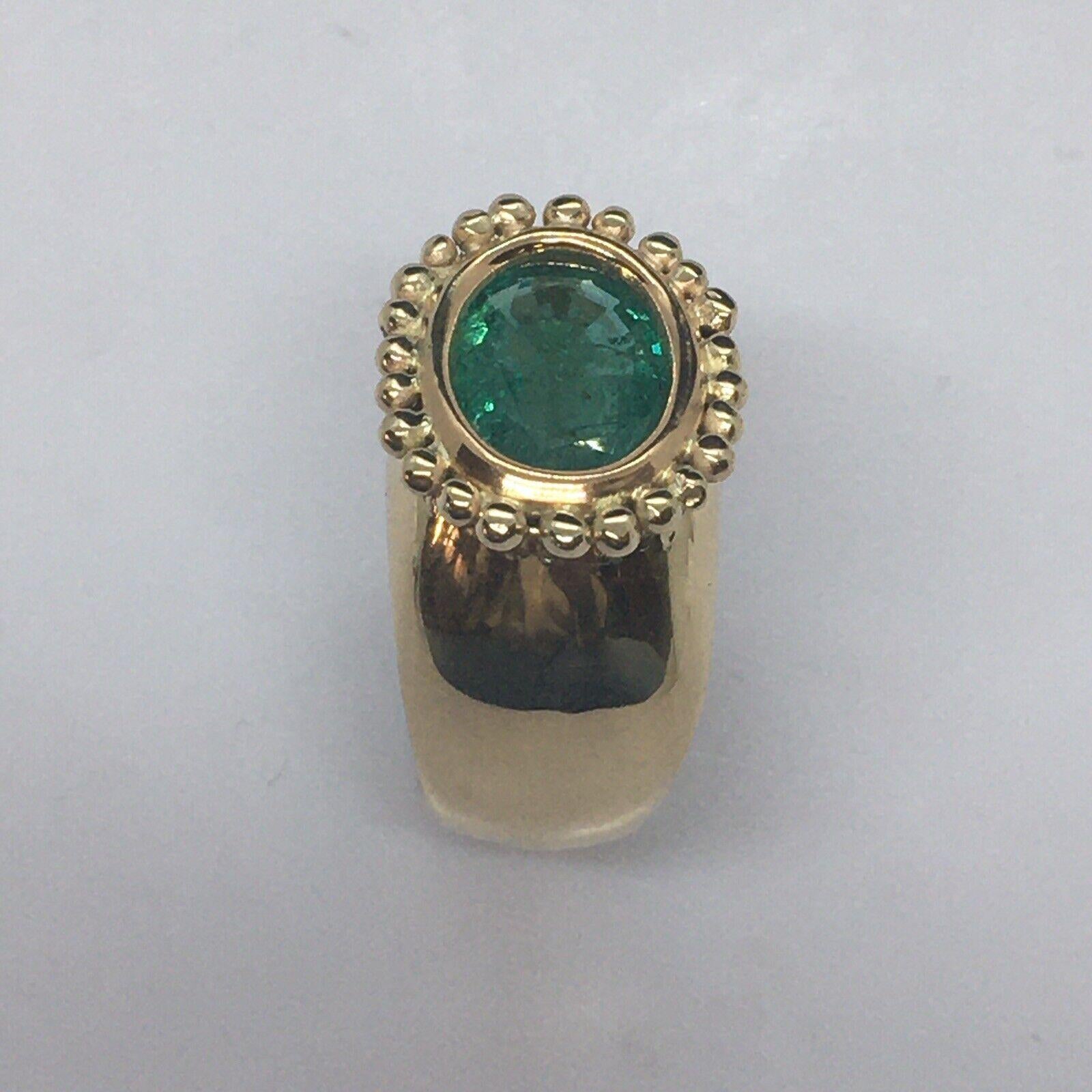 14K Yellow Gold Natural Earth Mined Emerald Halo Granulation Lady's Ring 


9.1 gram
Size 6
11.5mm by 8 mm by 4.5 mm natural Emerald calculating to be 2.15 Carat
Marked 