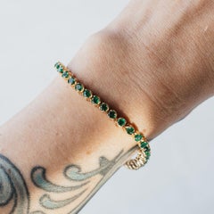 Bracciale tennis con smeraldo naturale in oro giallo 14K