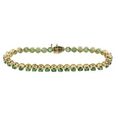 Bracciale tennis con smeraldo naturale in oro giallo 14K