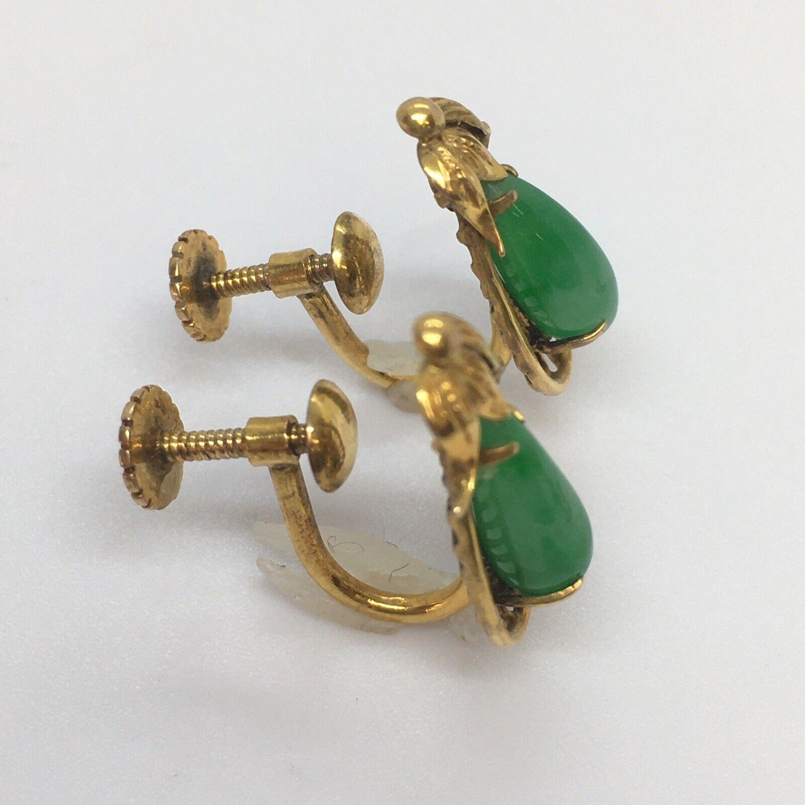 14K Yellow Gold Natural Green Jade  Non Pierced Earrings 1930s Handmade American

Weighting 3.2 gram
17 mm or 1/2 inch long 6.5mm or 1/4 inch wide
Marked screw back
Art Deco circa 1920s
American made