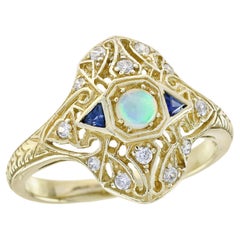 Anello in oro giallo 14K in stile vintage con zaffiro blu opale naturale e diamanti