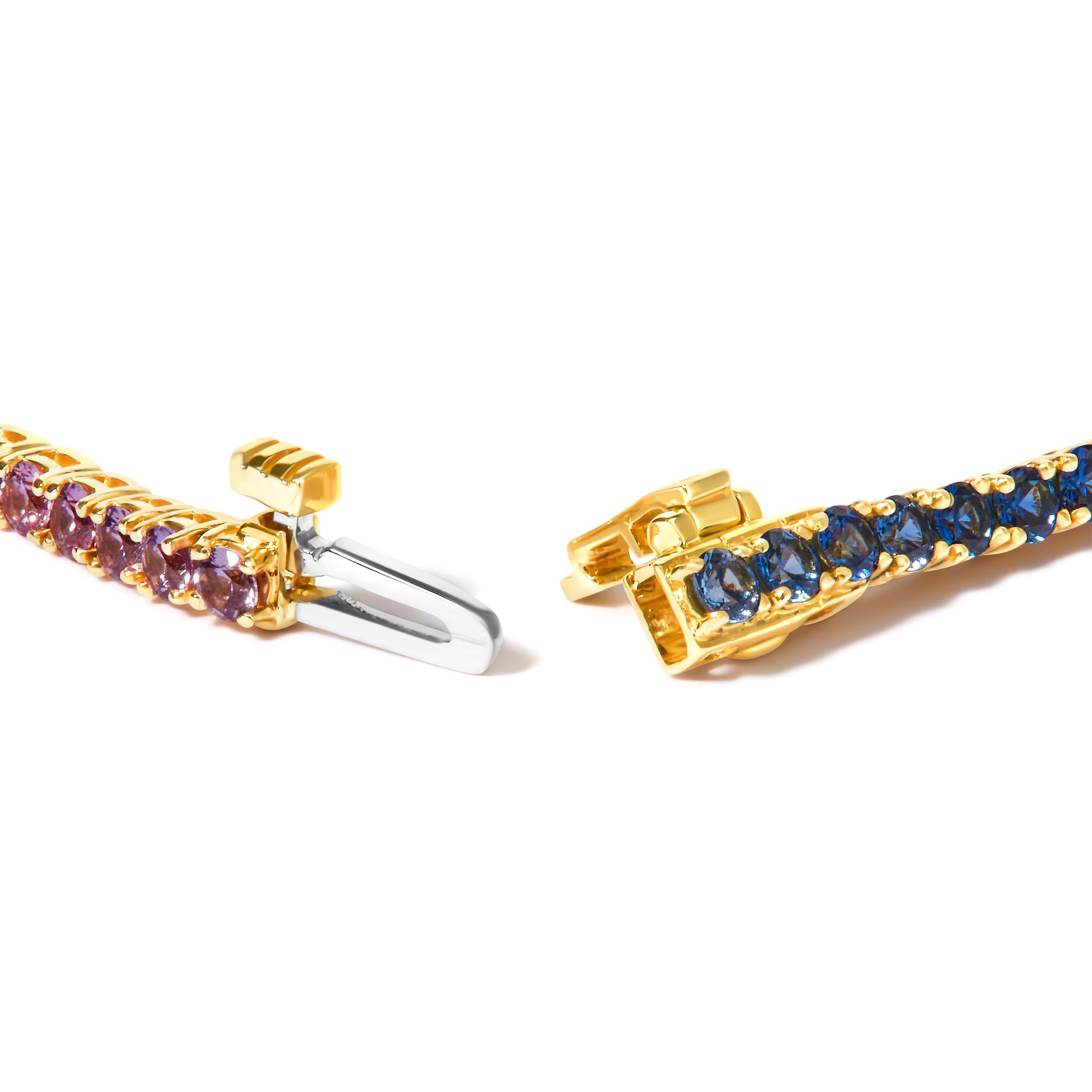 Immerse yourself in a kaleidoscope of color with our Natural Rainbow Gemstone Tennis Bracelet, crafted from exquisite 14K yellow gold. Adorned with 13 natural gemstones including blue, yellow, and pink sapphires, green tsavorites, and red garnets,